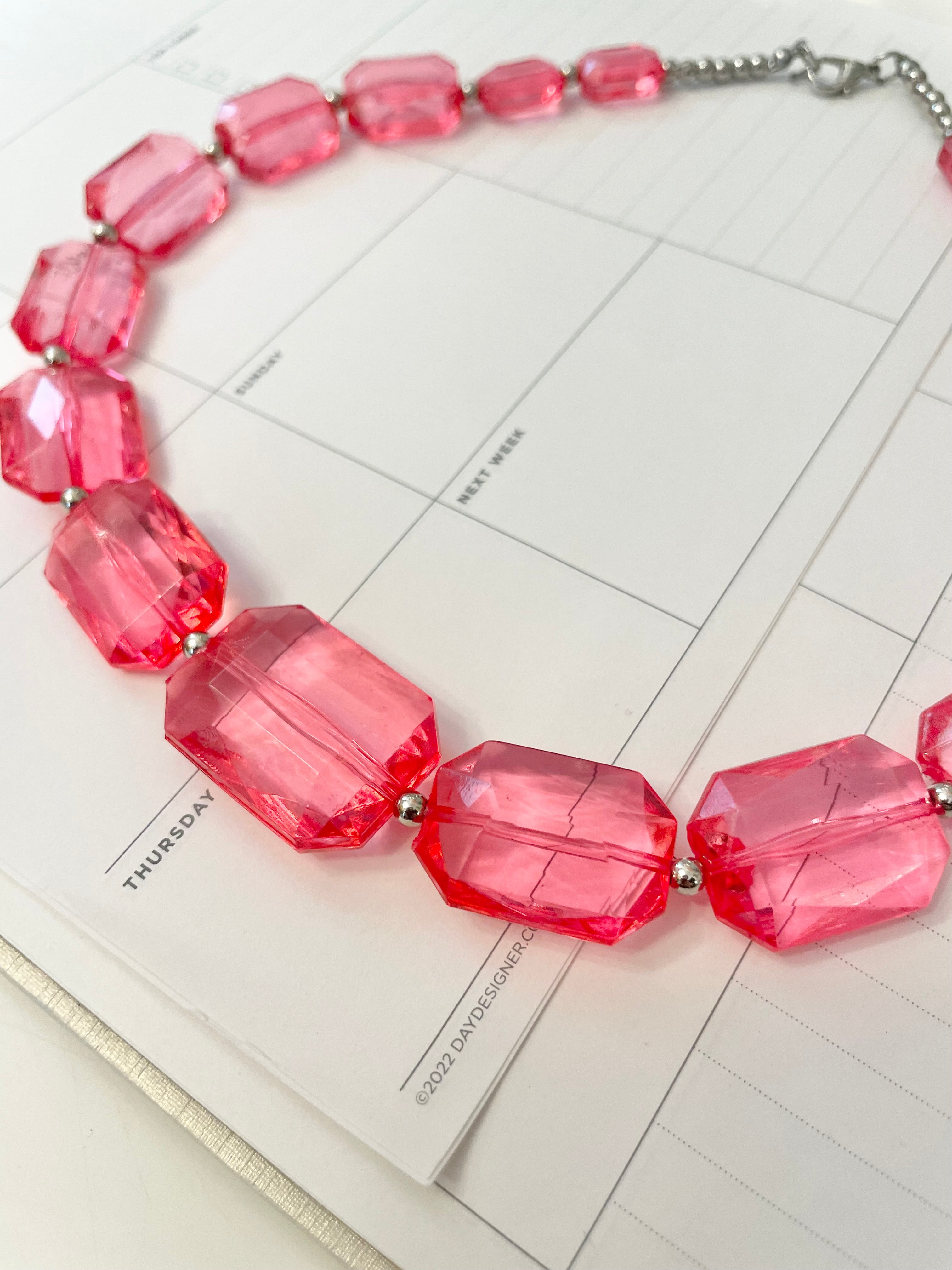 The Flirty gal is always in love with a classy pink necklace...