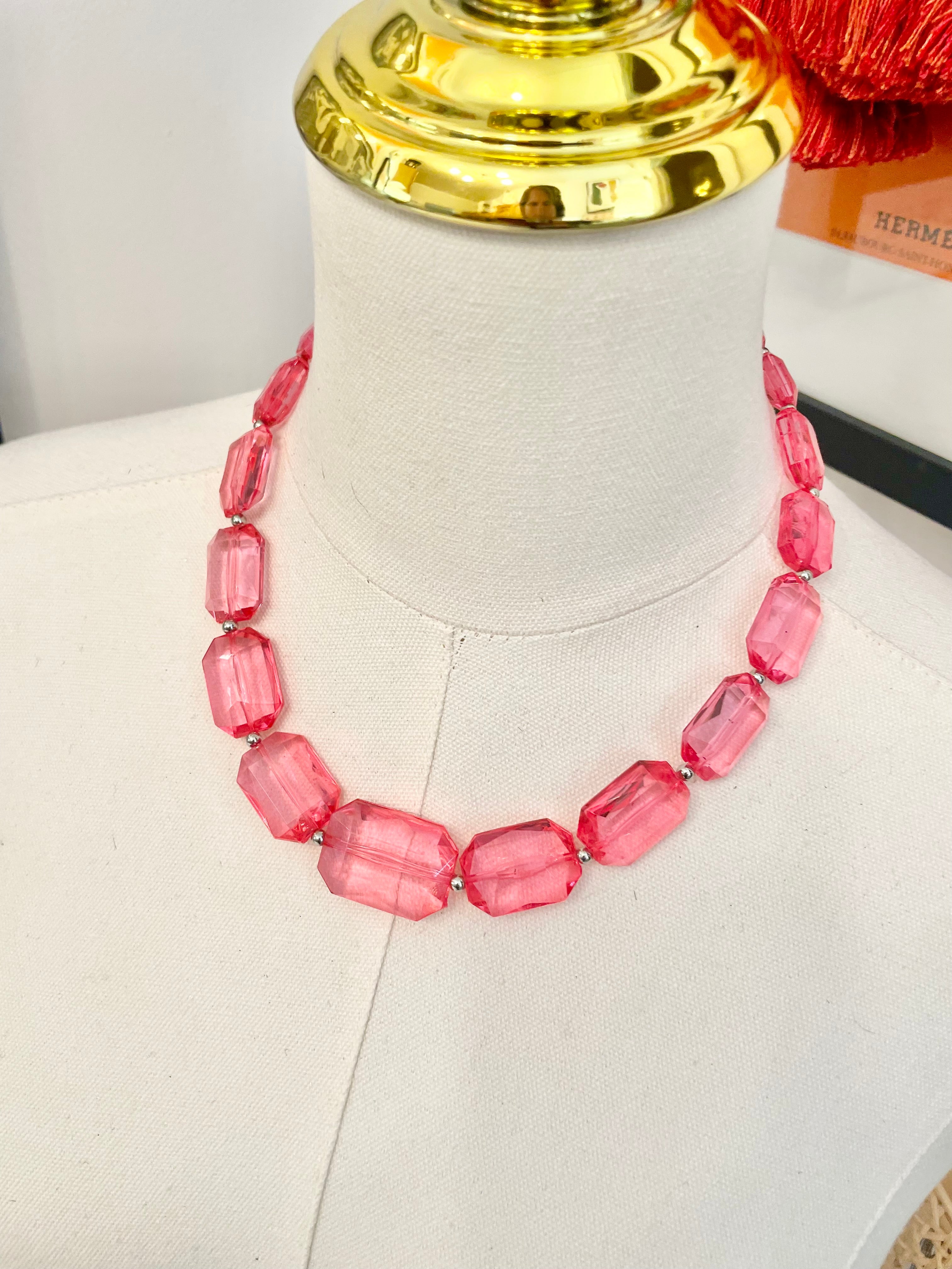 The Flirty gal is always in love with a classy pink necklace...