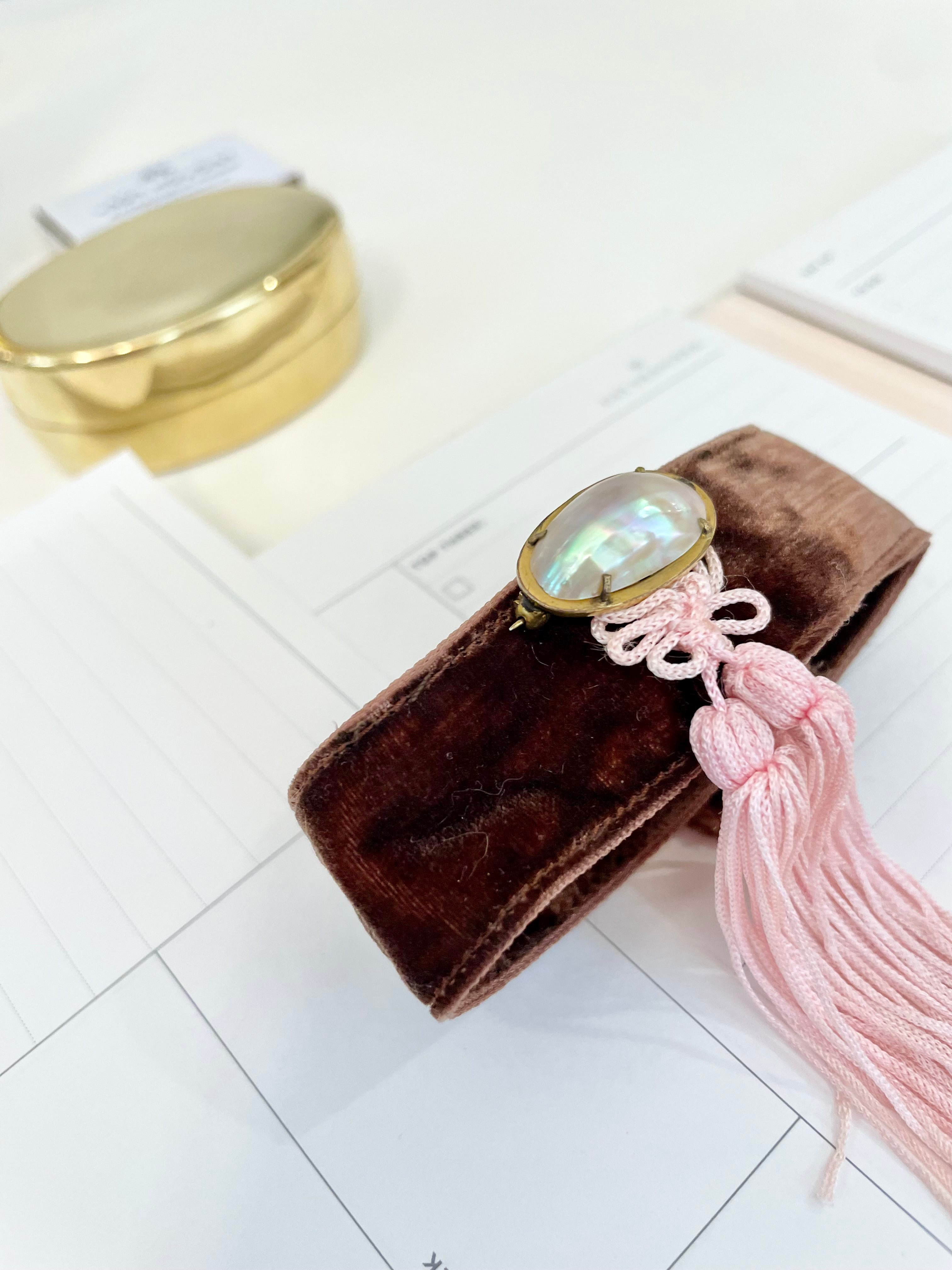 Ladies on Holiday stunning velvet tassel brooch adorned with a fresh water pearl... so chic