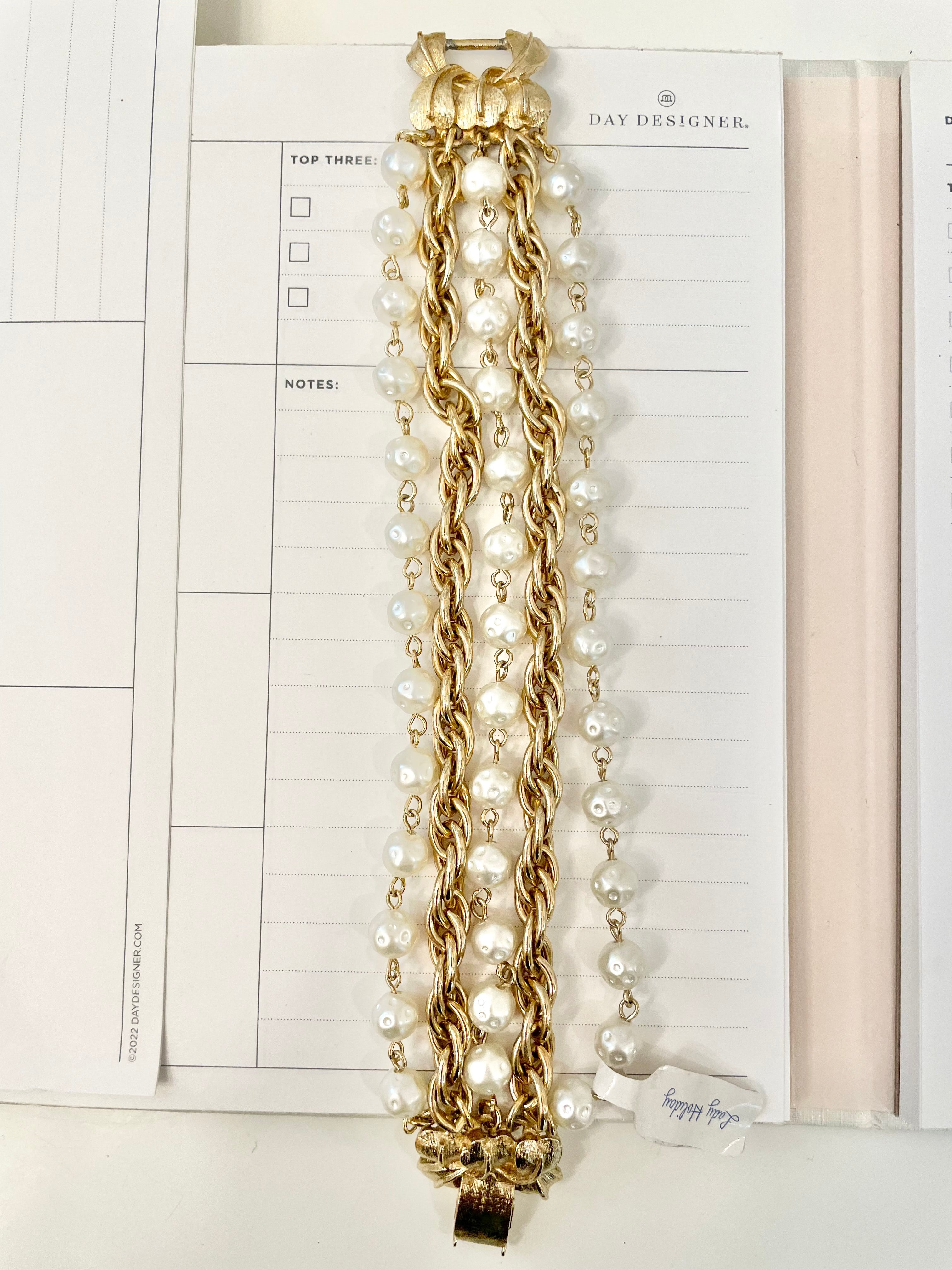 1960's multi strand bracelet.. I adore the chain and pearls together.