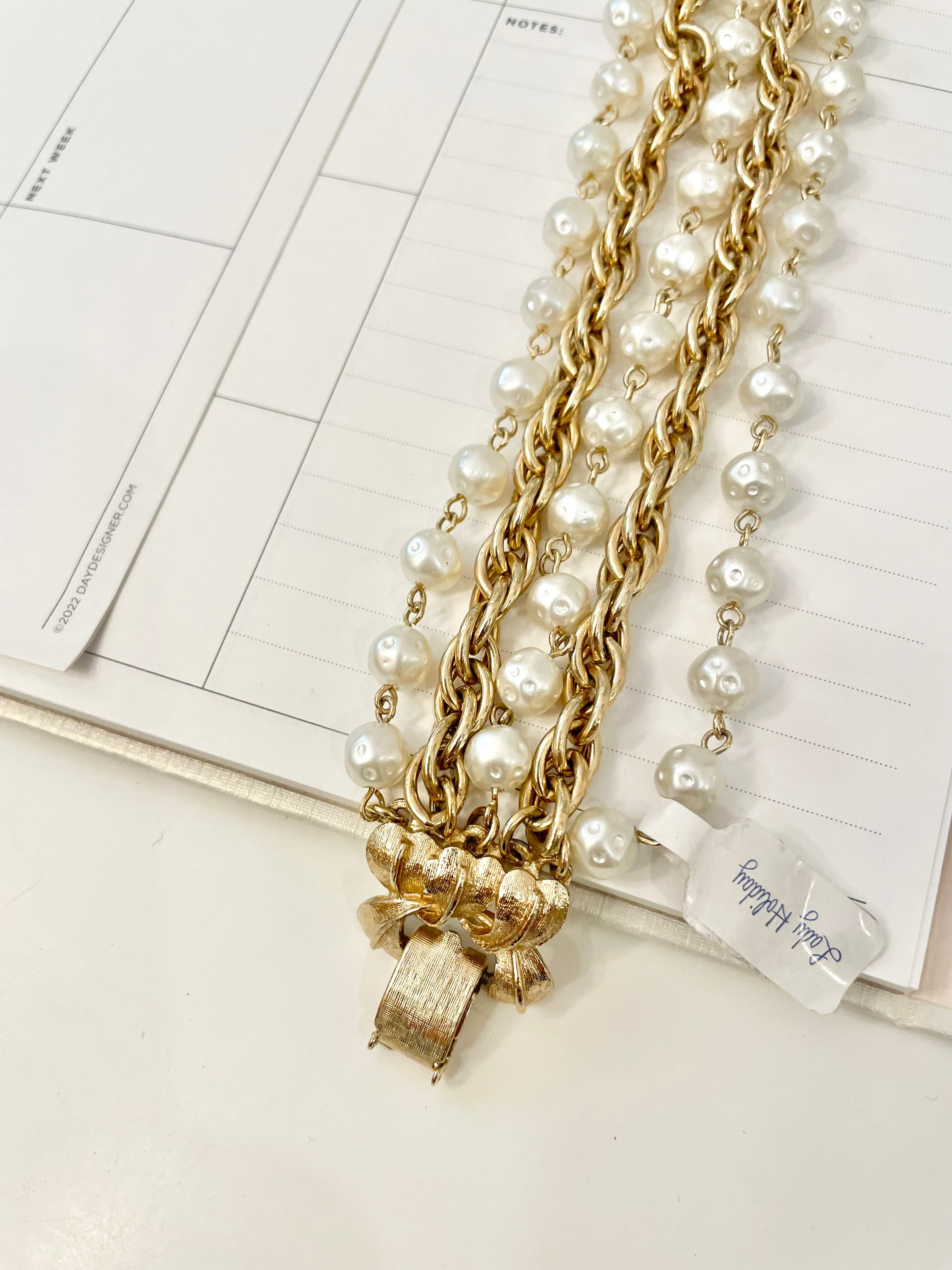 1960's multi strand bracelet.. I adore the chain and pearls together.