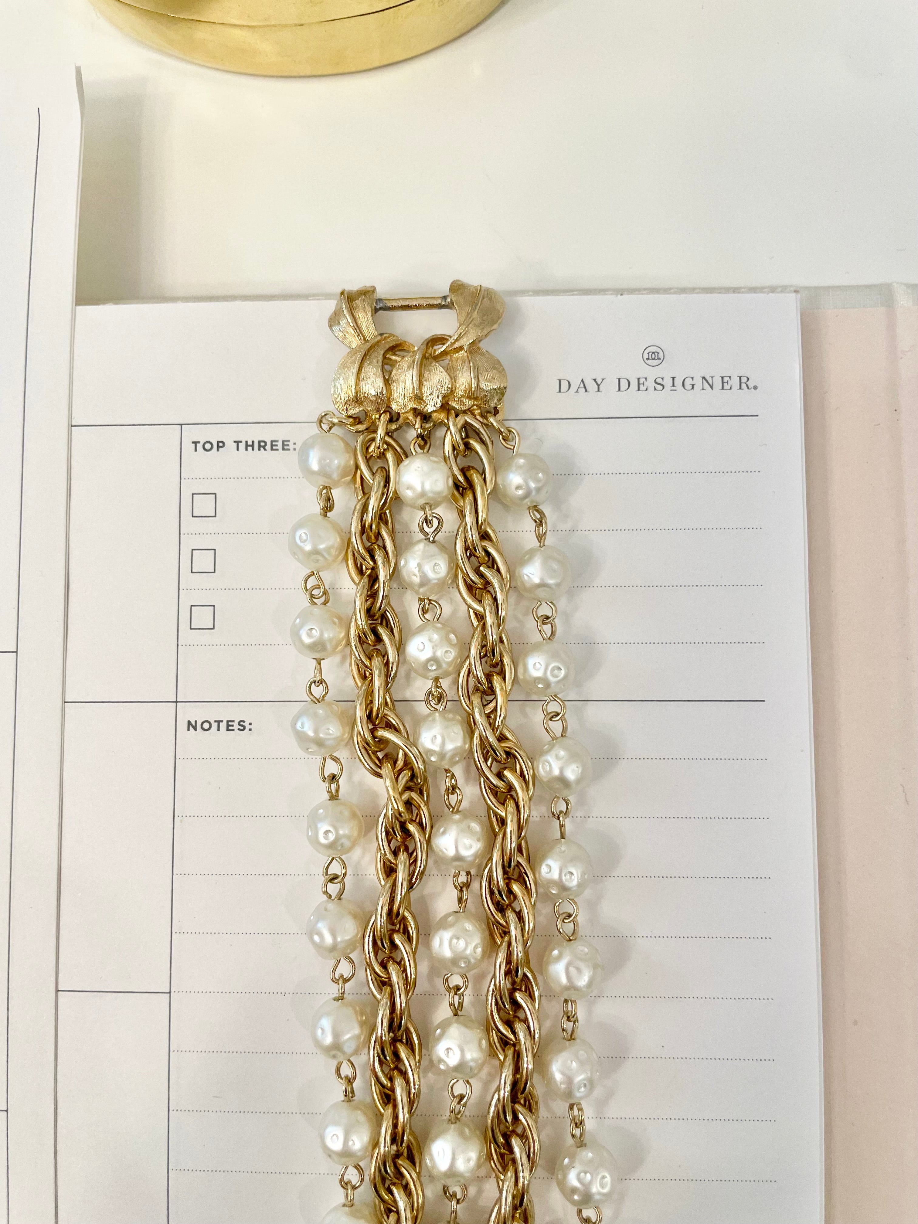 1960's multi strand bracelet.. I adore the chain and pearls together.