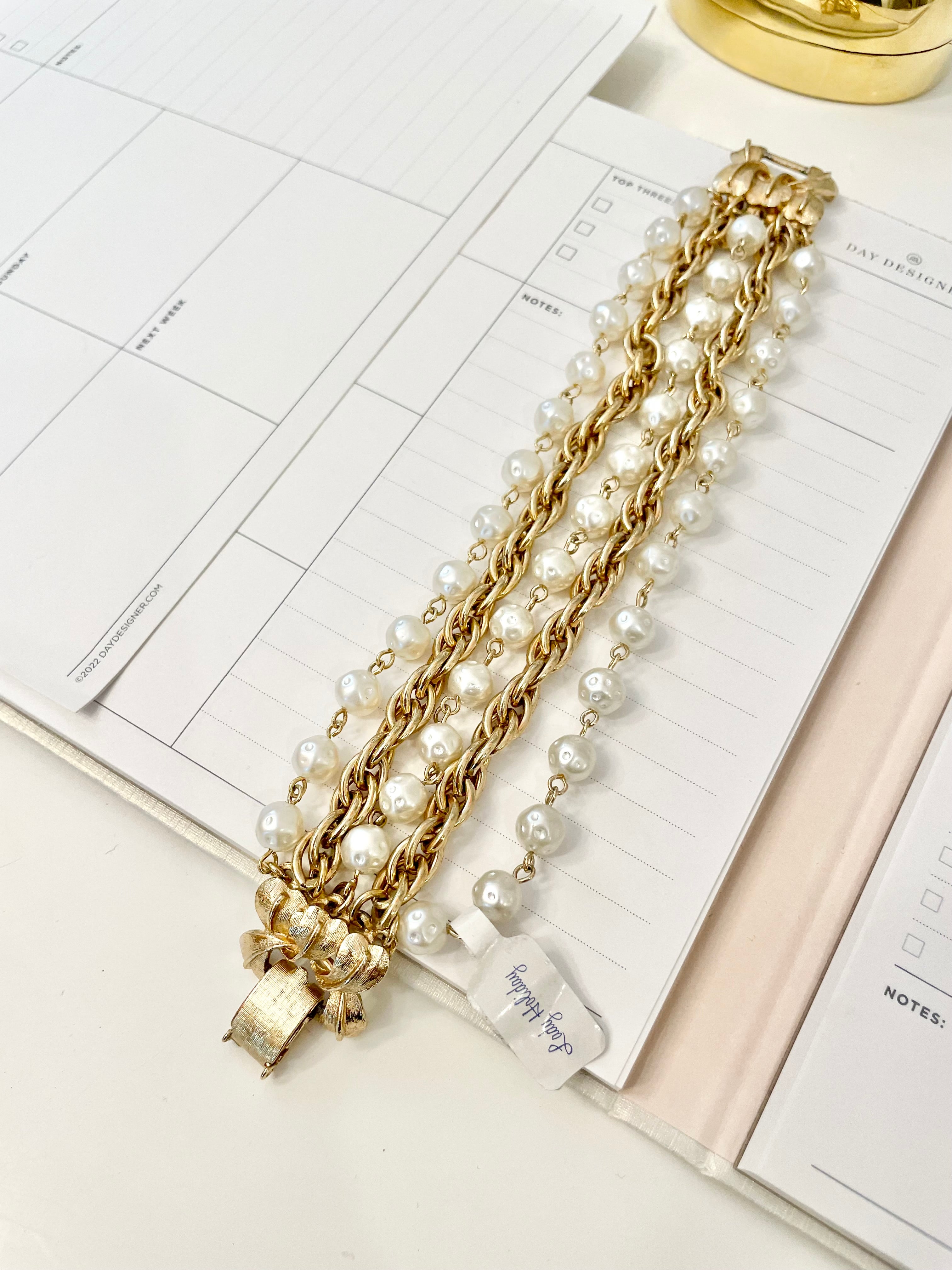 1960's multi strand bracelet.. I adore the chain and pearls together.