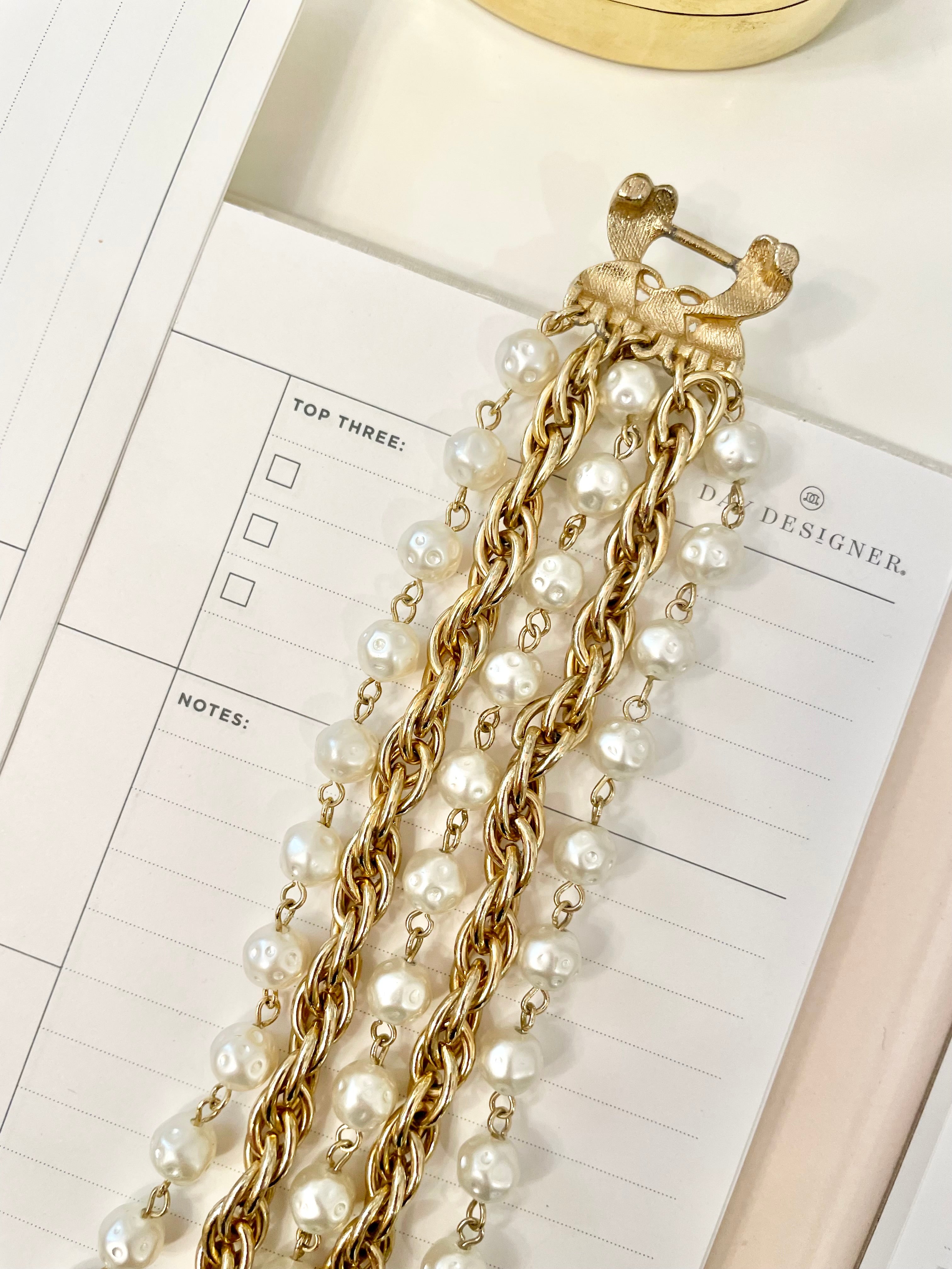 1960's multi strand bracelet.. I adore the chain and pearls together.