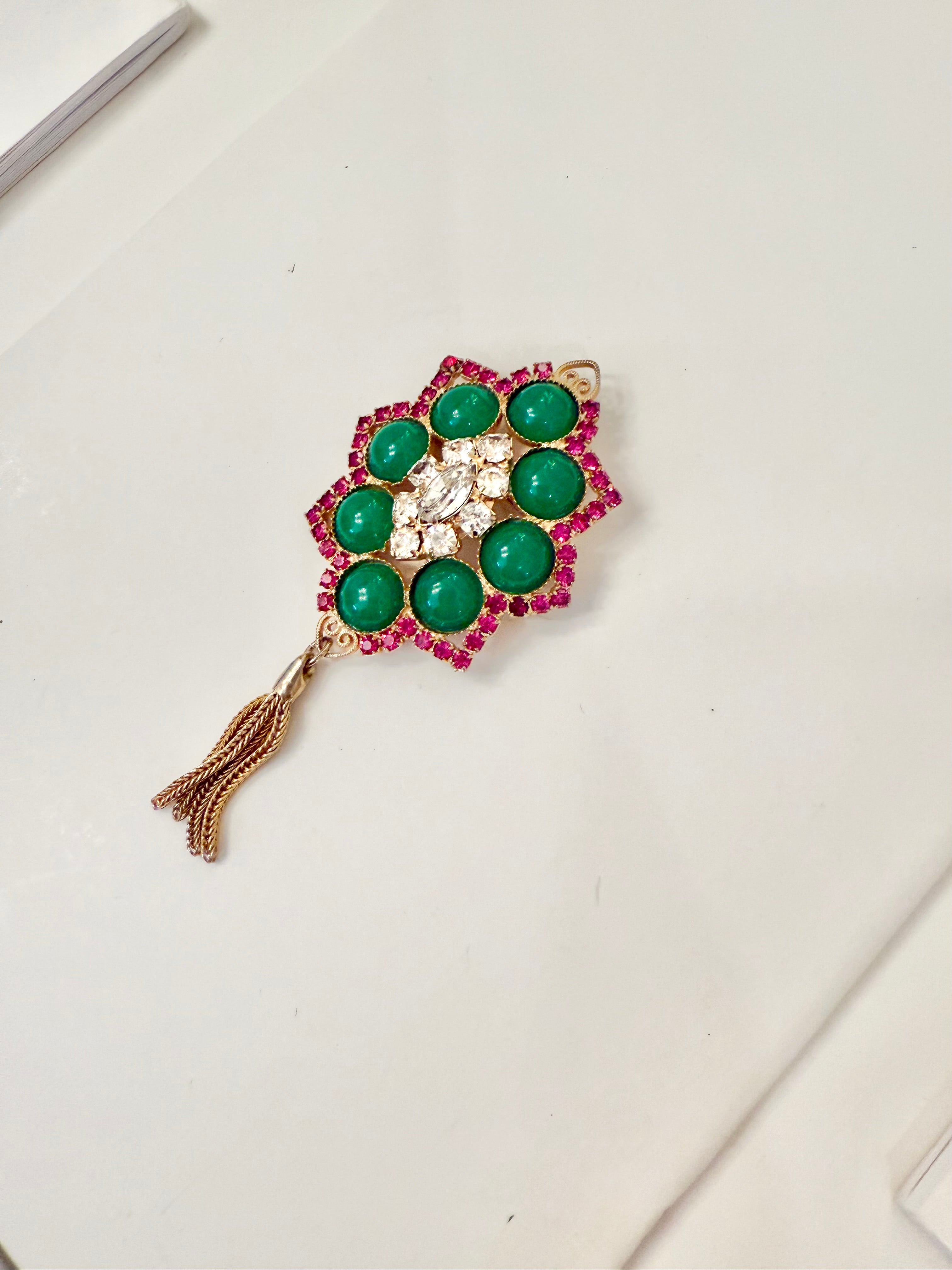 1960's extraordinary ruby and jade colored glass tassel brooch.... so darling!