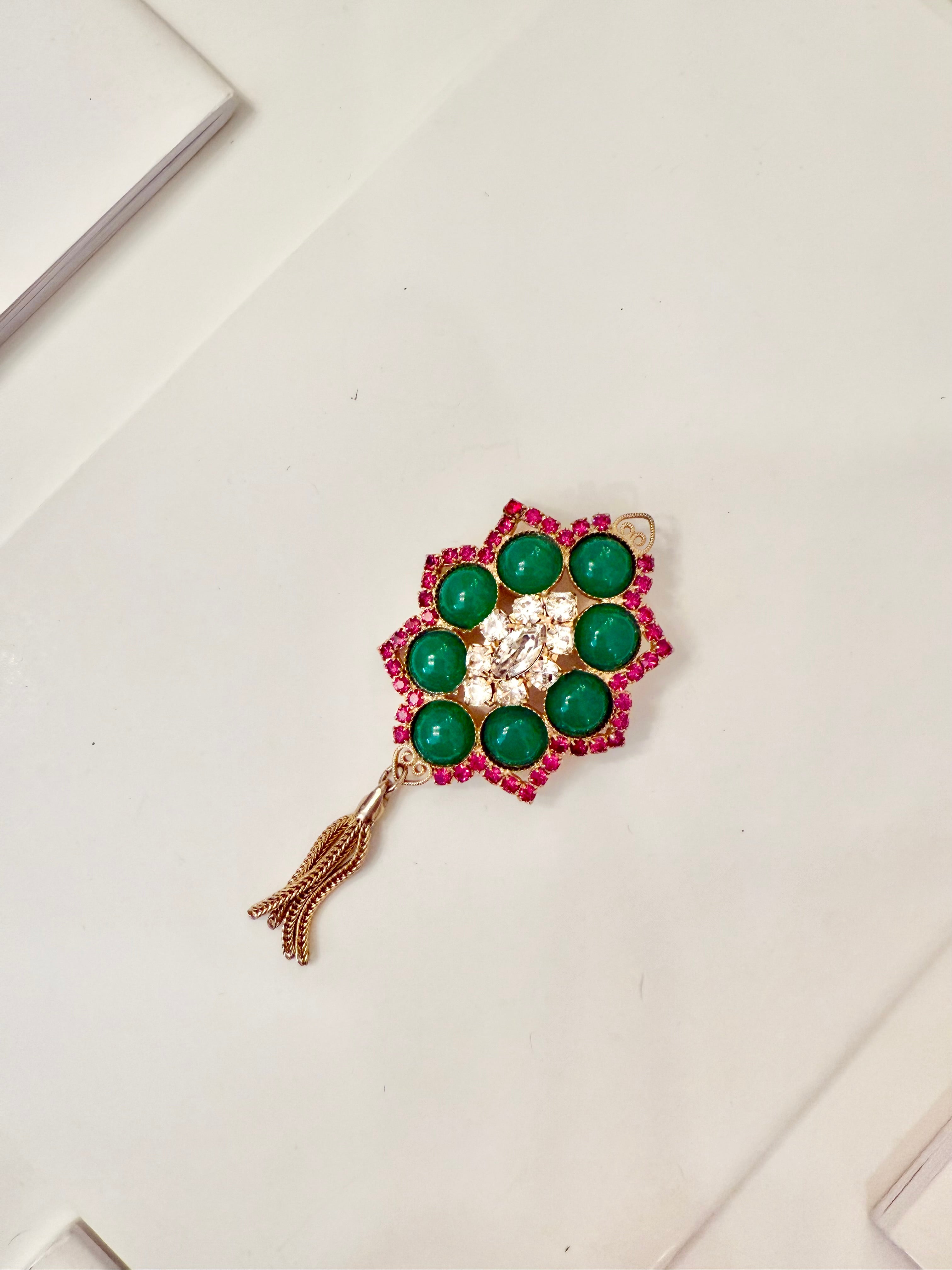 1960's extraordinary ruby and jade colored glass tassel brooch.... so darling!