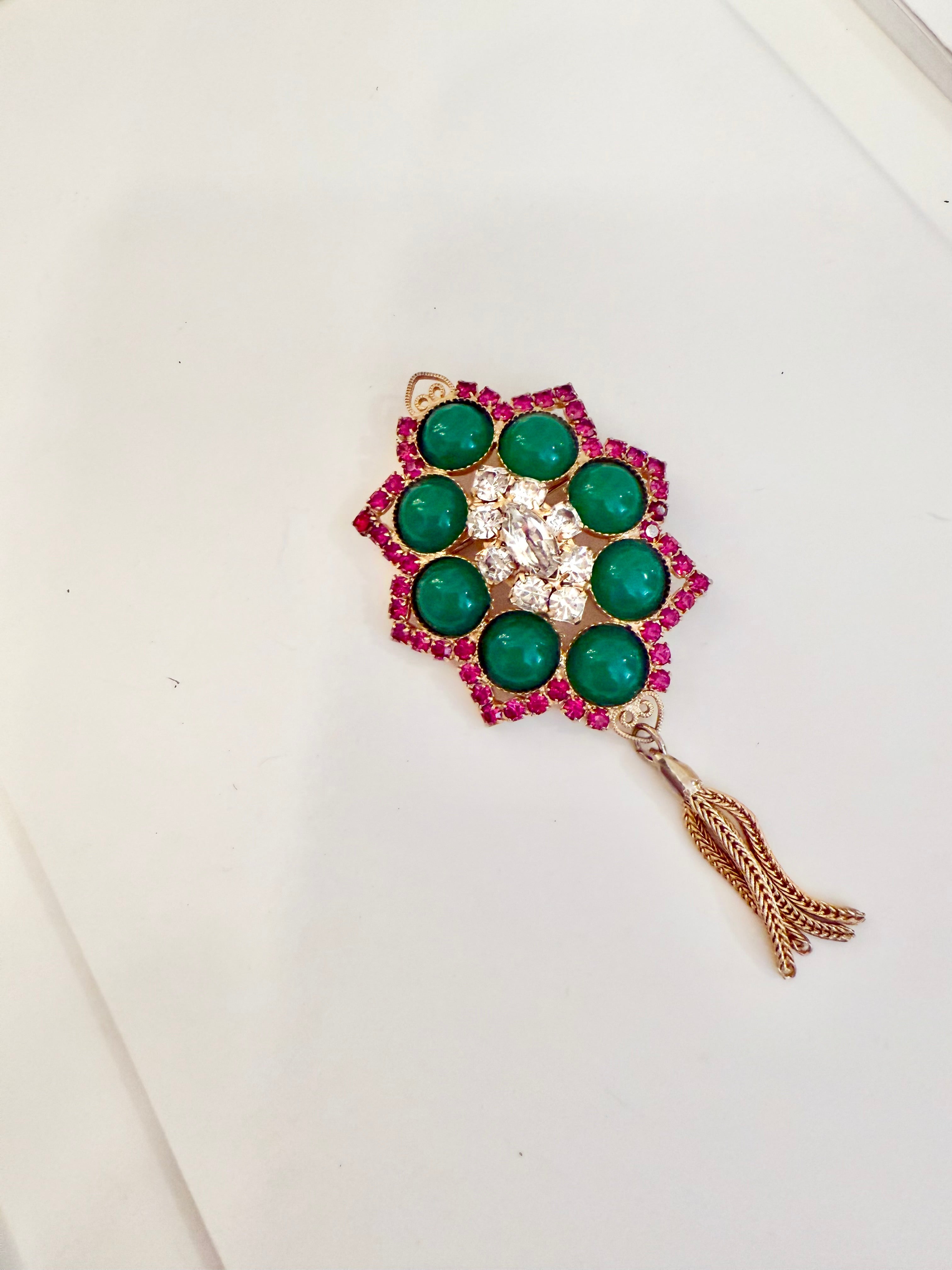 1960's extraordinary ruby and jade colored glass tassel brooch.... so darling!