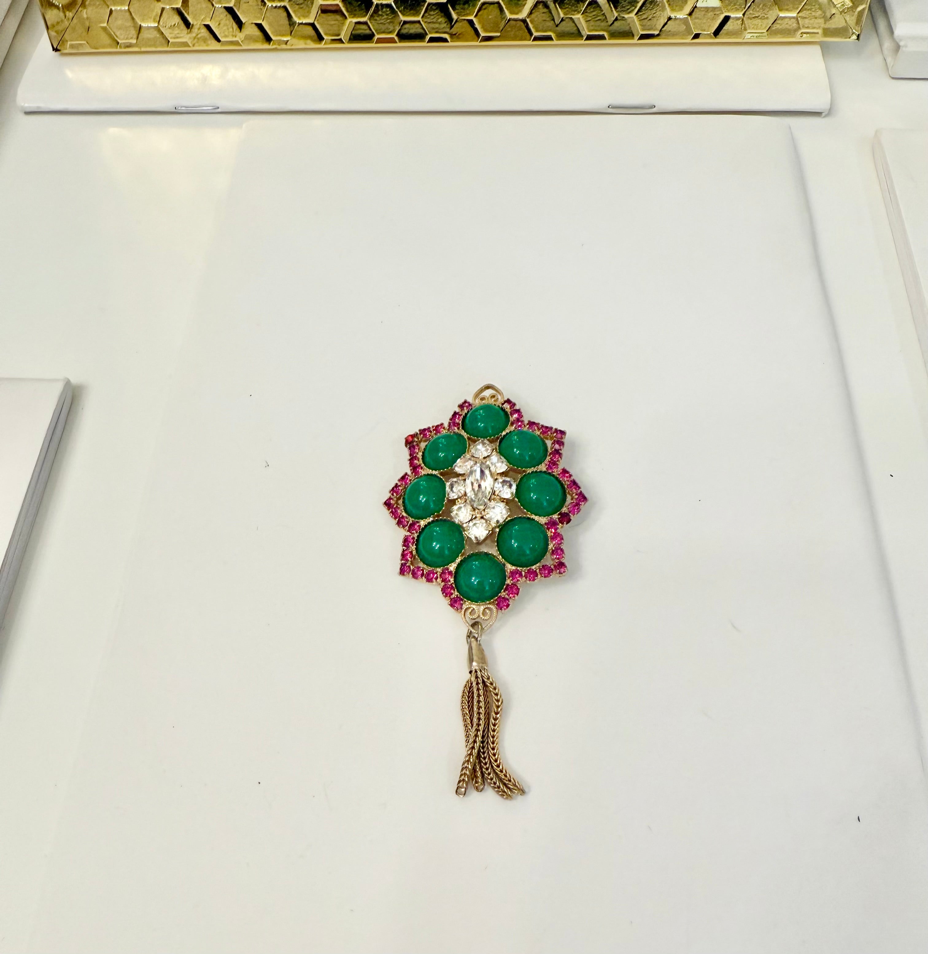1960's extraordinary ruby and jade colored glass tassel brooch.... so darling!