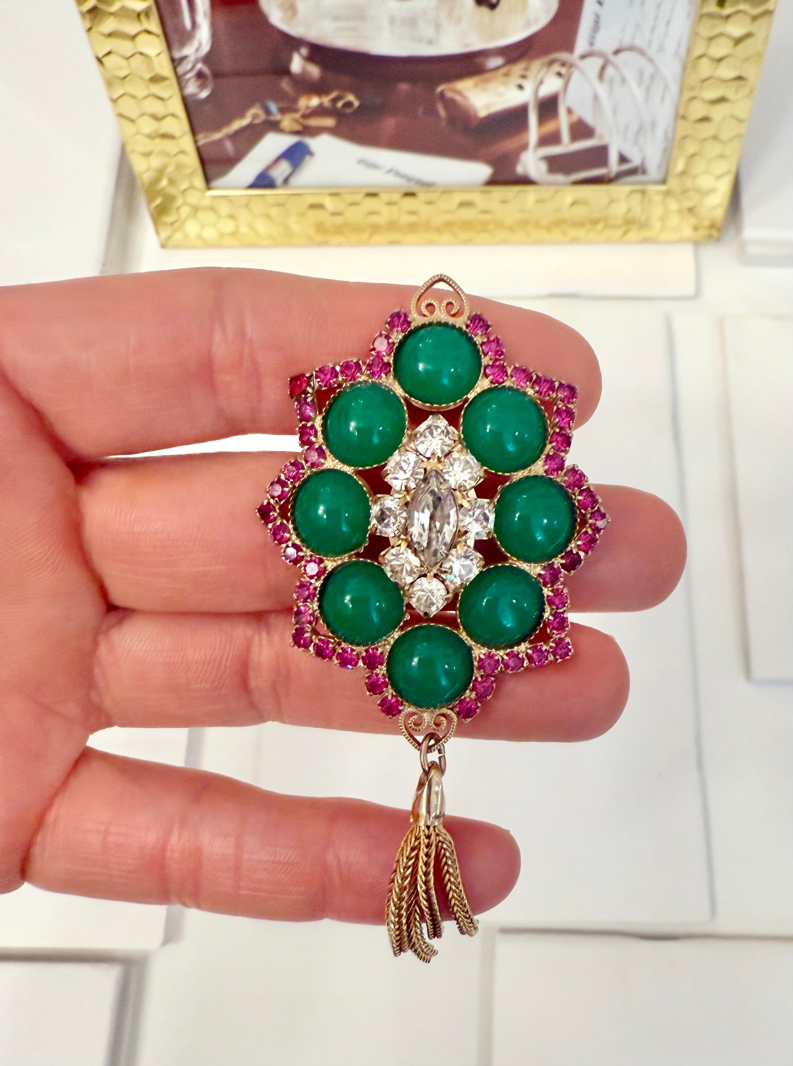 1960's extraordinary ruby and jade colored glass tassel brooch.... so darling!