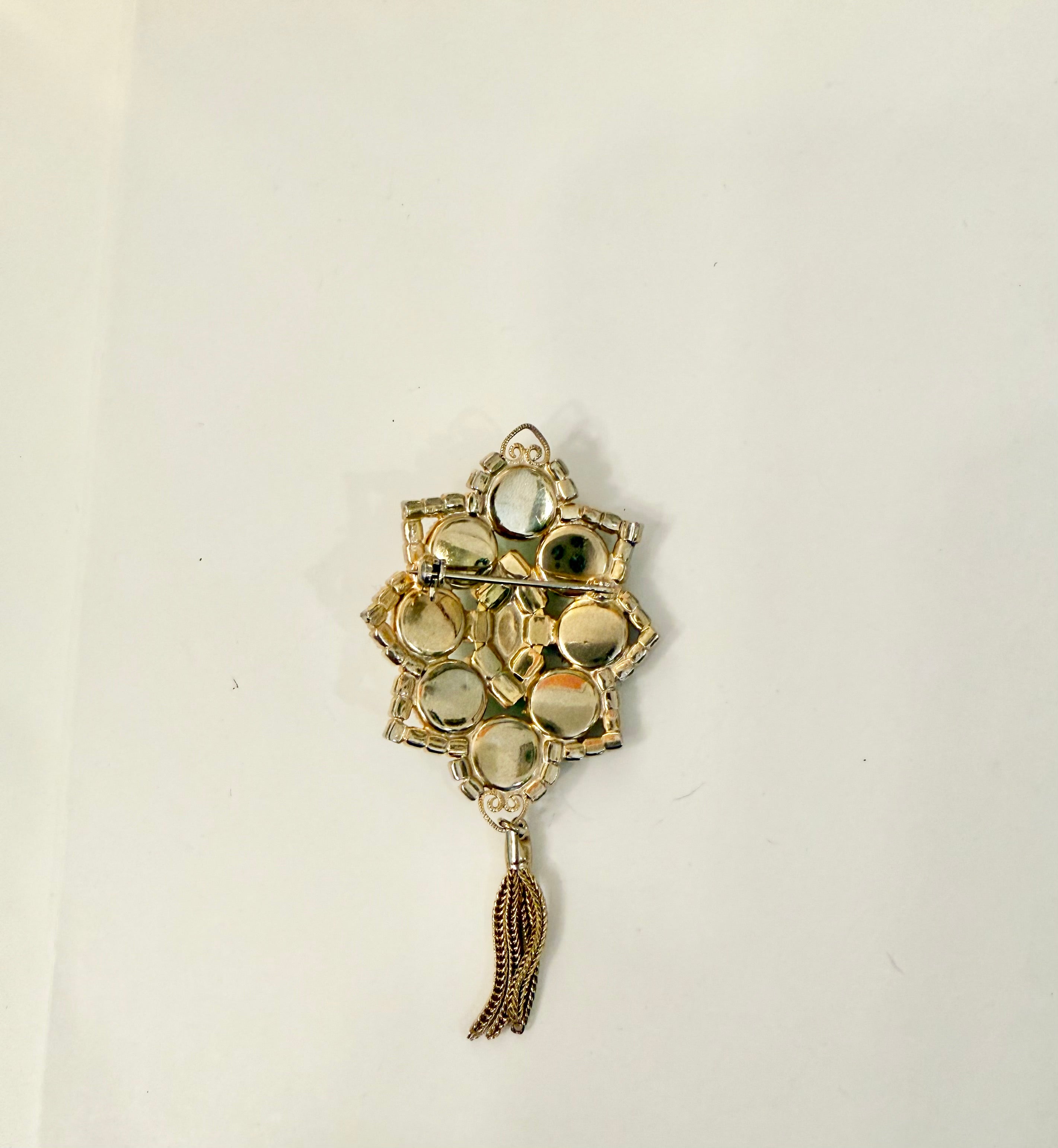 1960's extraordinary ruby and jade colored glass tassel brooch.... so darling!