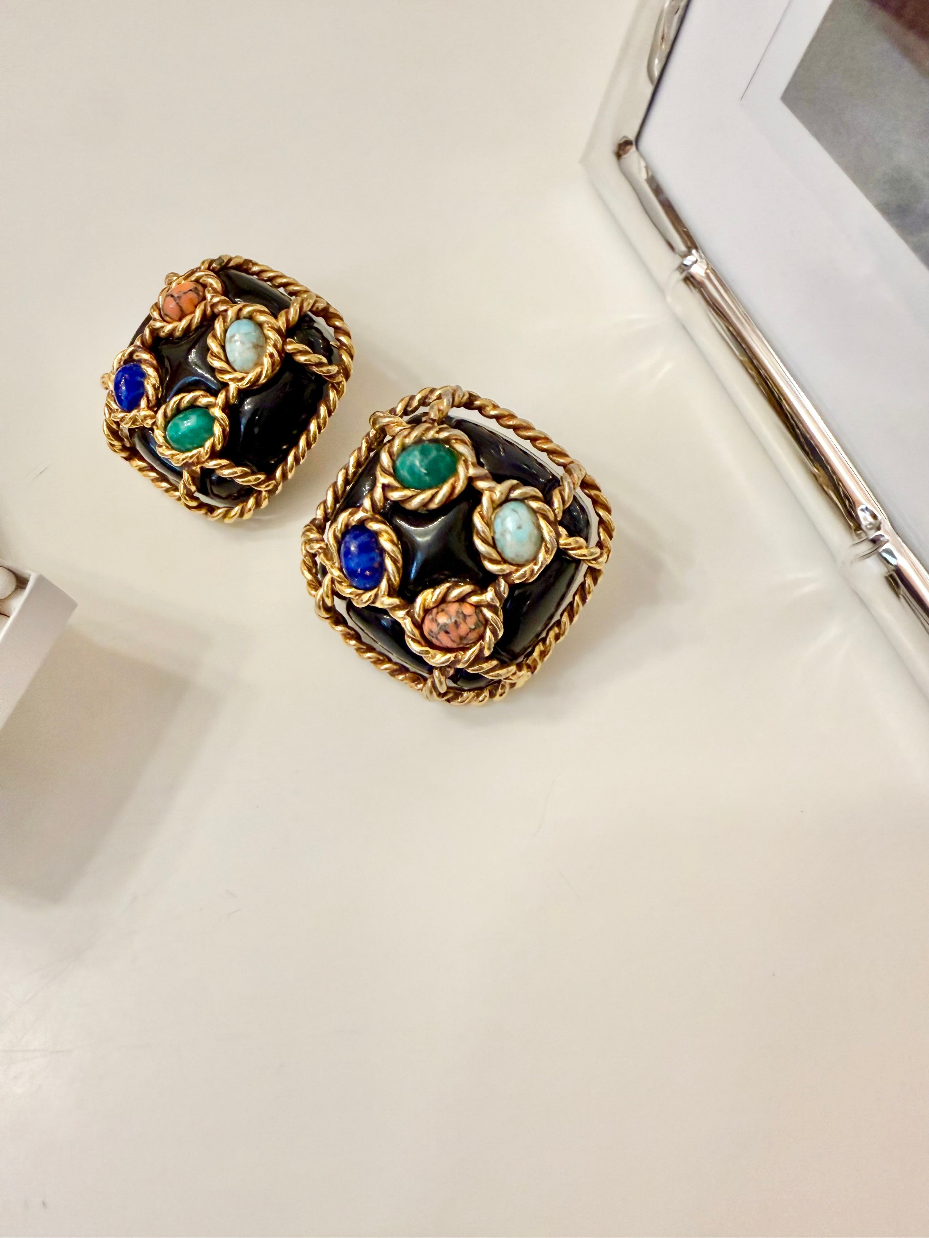 The most dramatic noir button earrings....