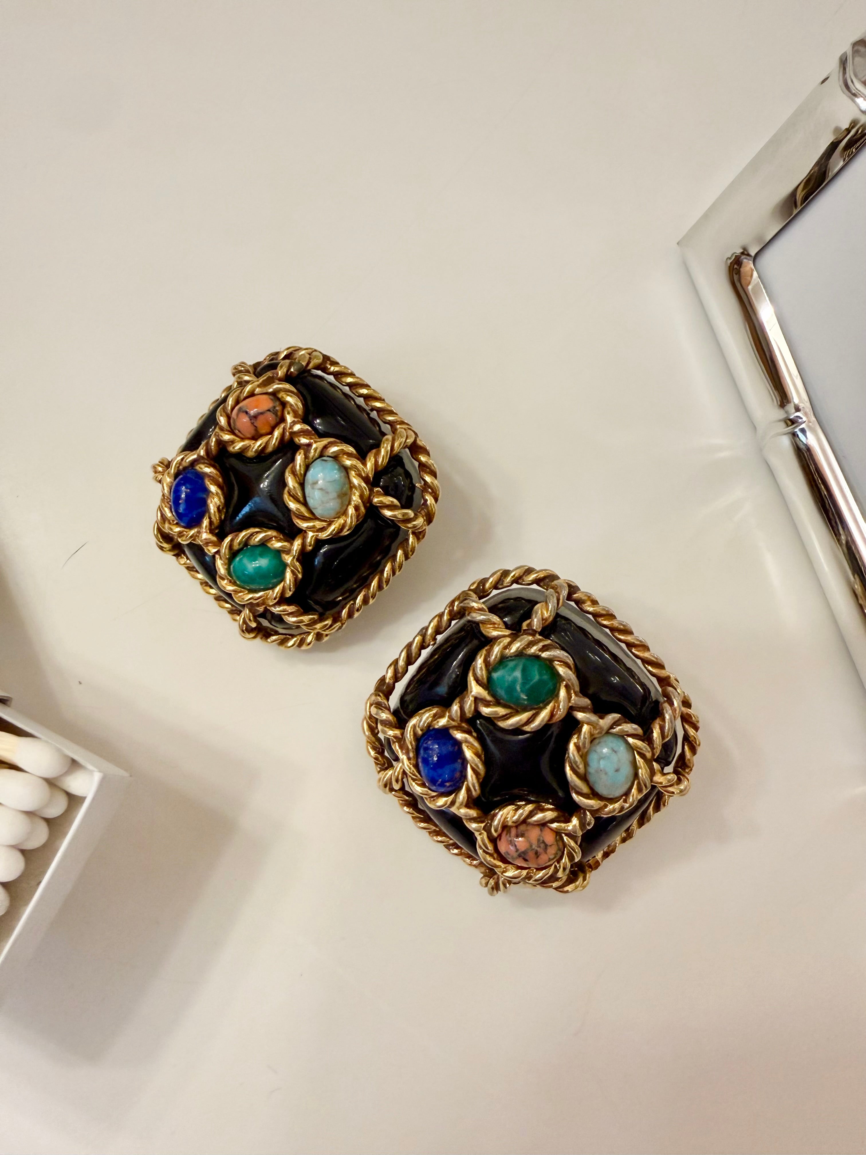 The most dramatic noir button earrings....