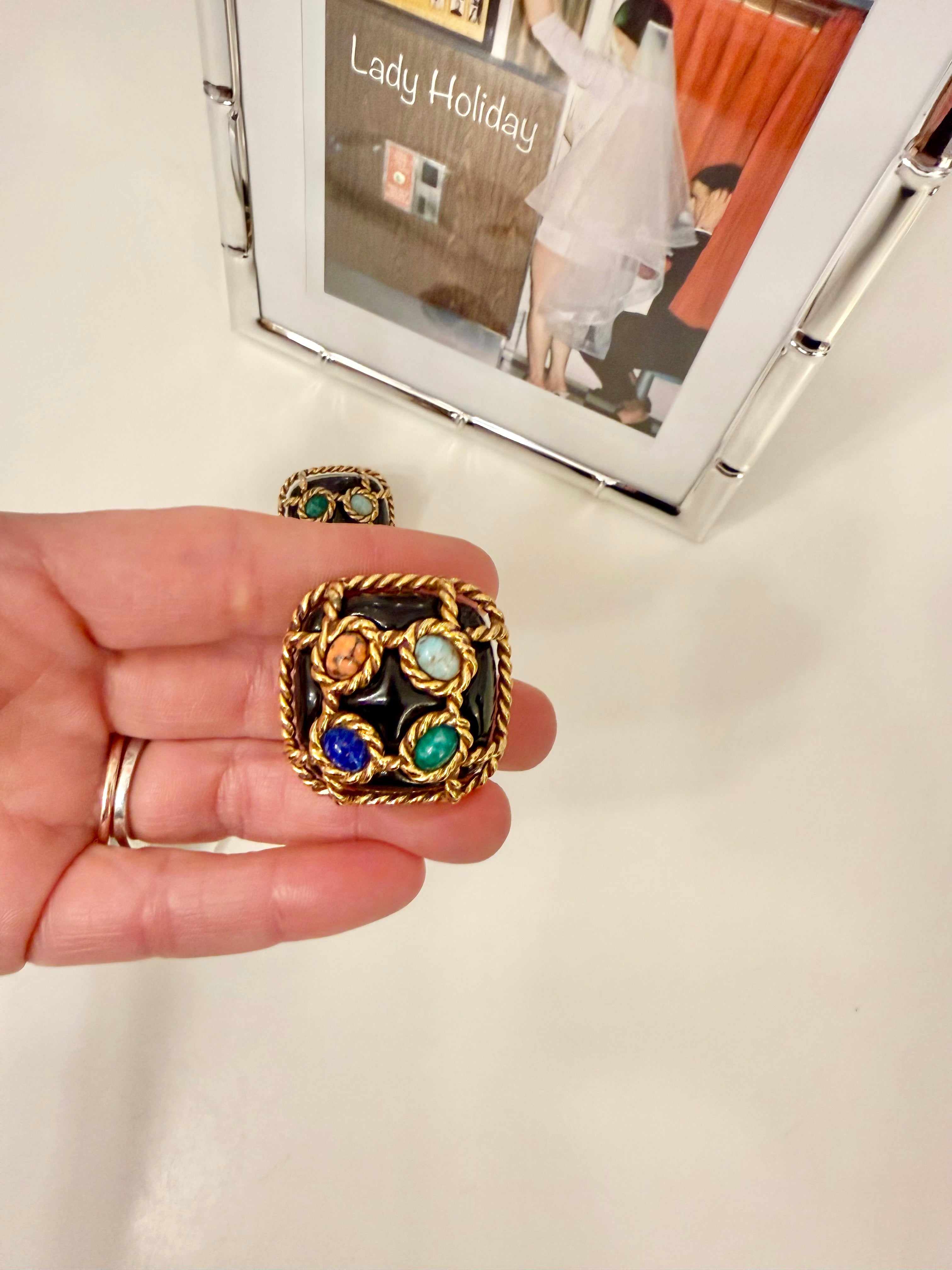 The most dramatic noir button earrings....