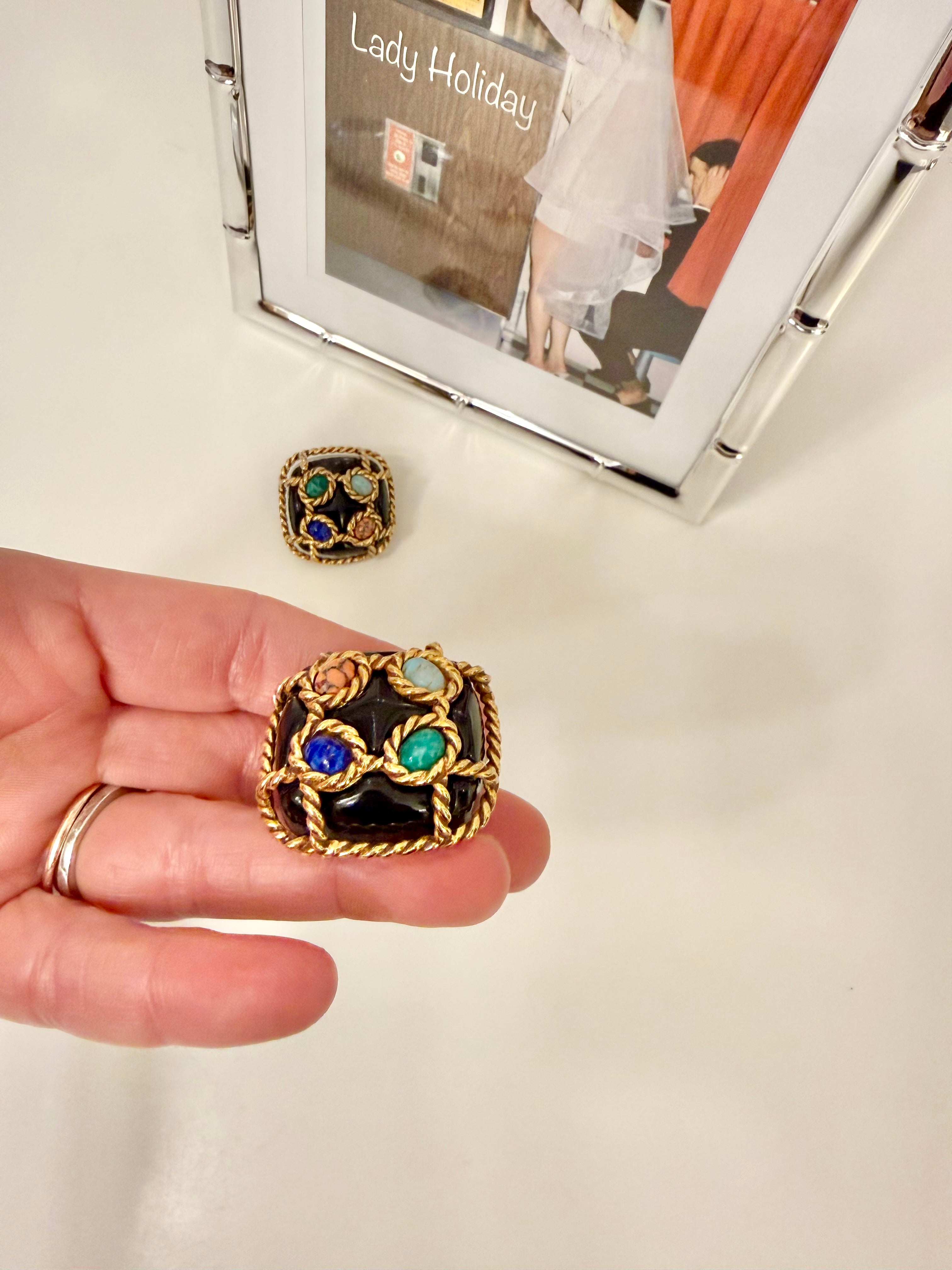 The most dramatic noir button earrings....