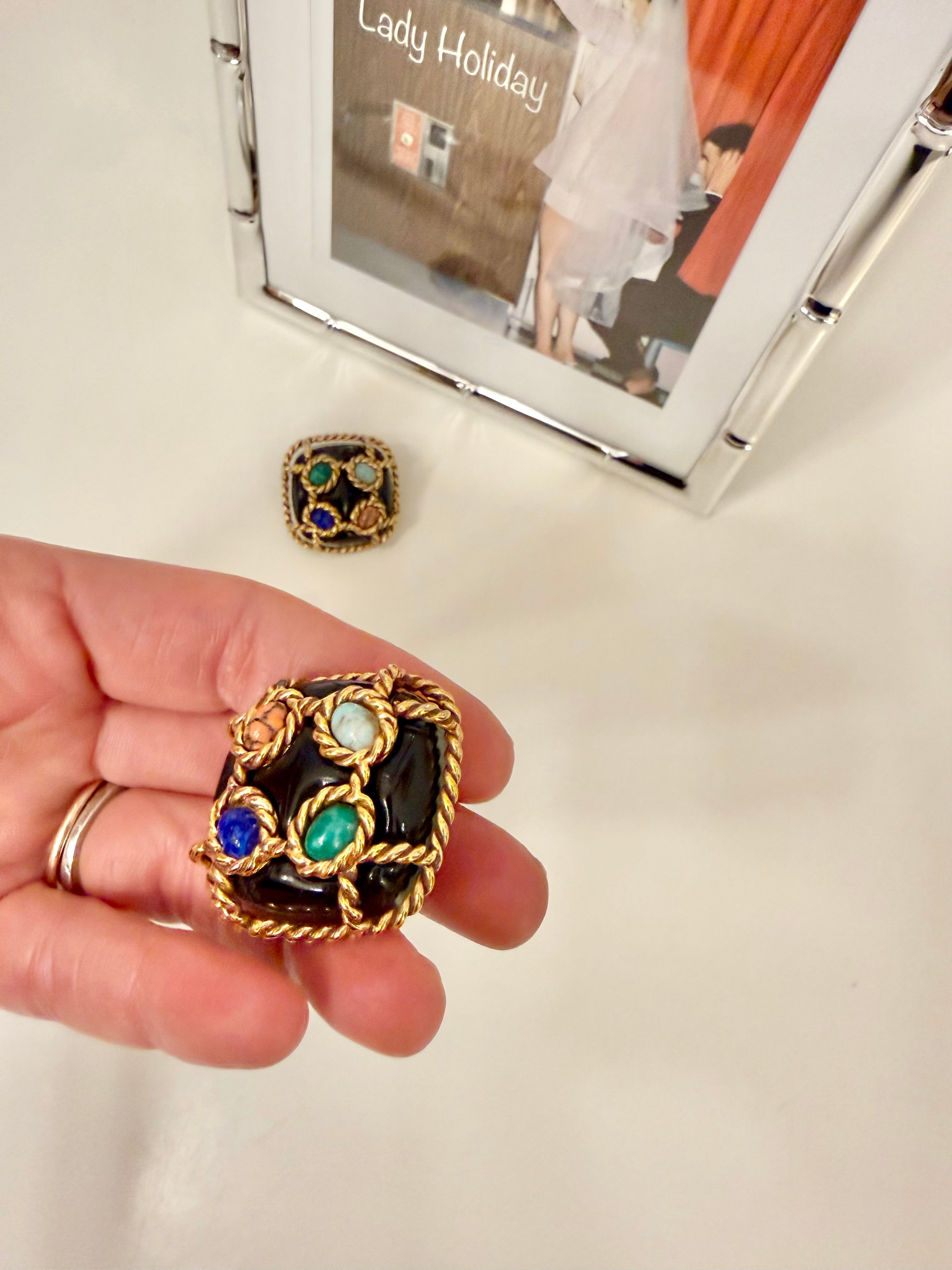 The most dramatic noir button earrings....