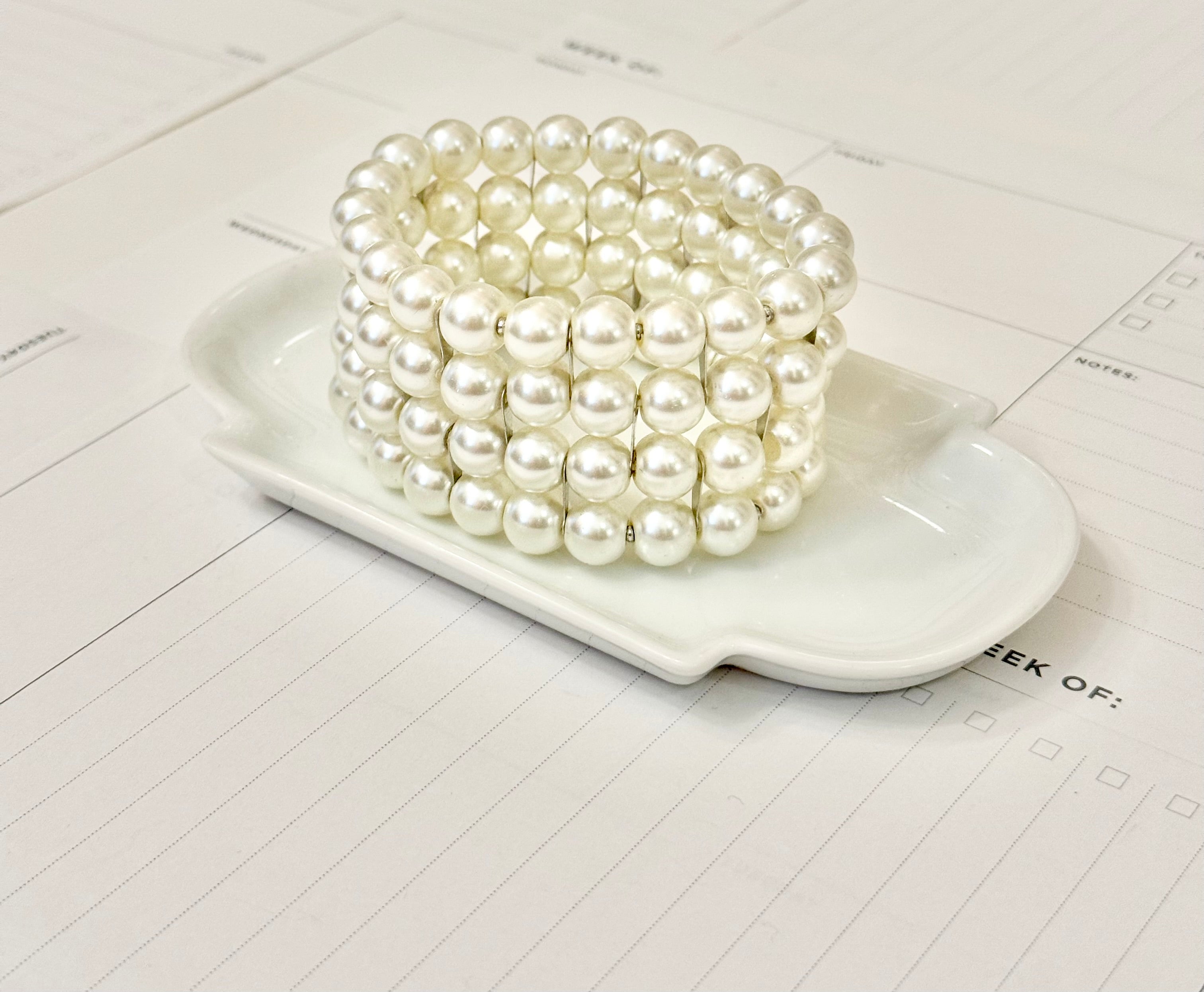 The most charming multi strand pearl bracelet....