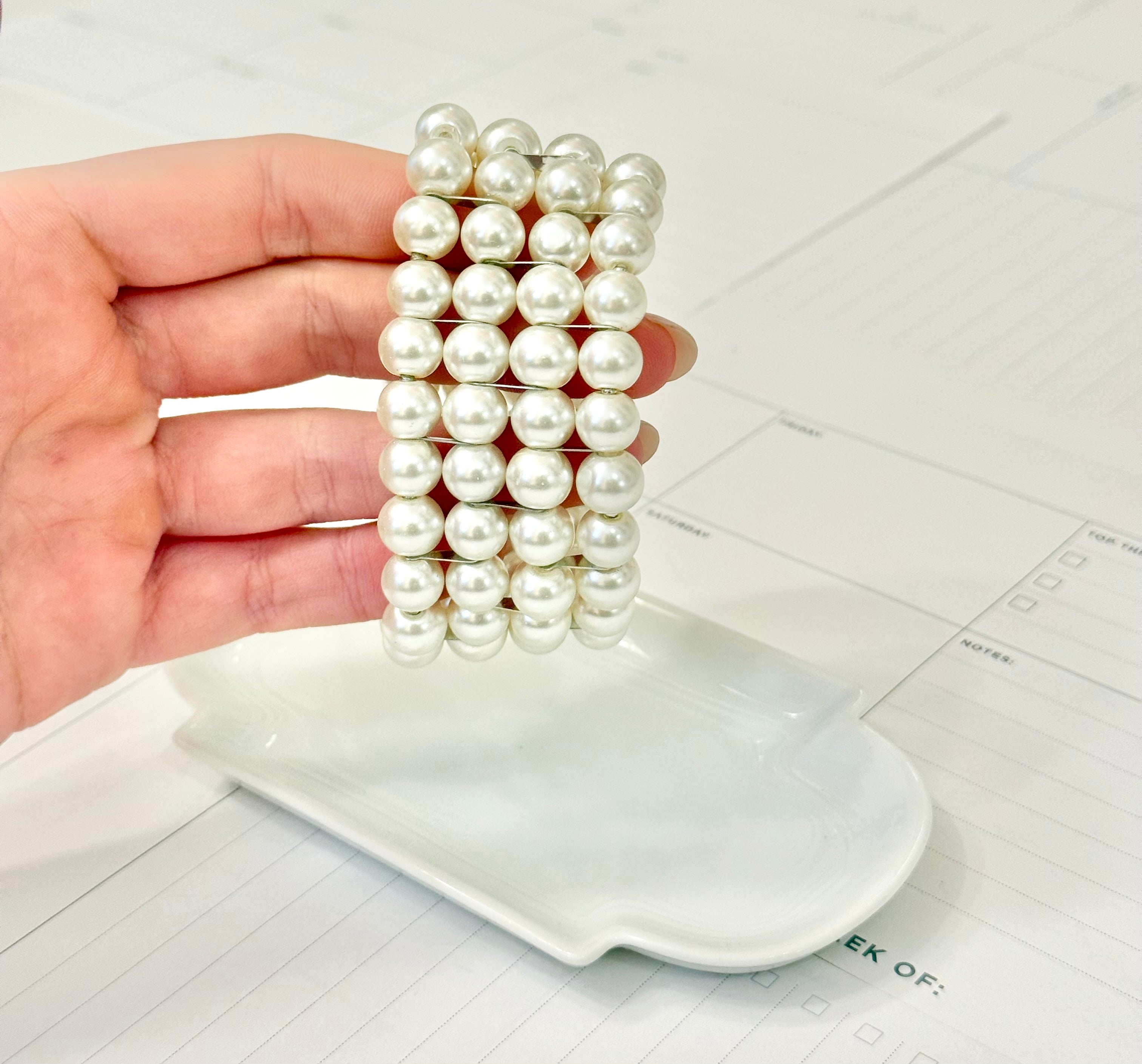 The most charming multi strand pearl bracelet....