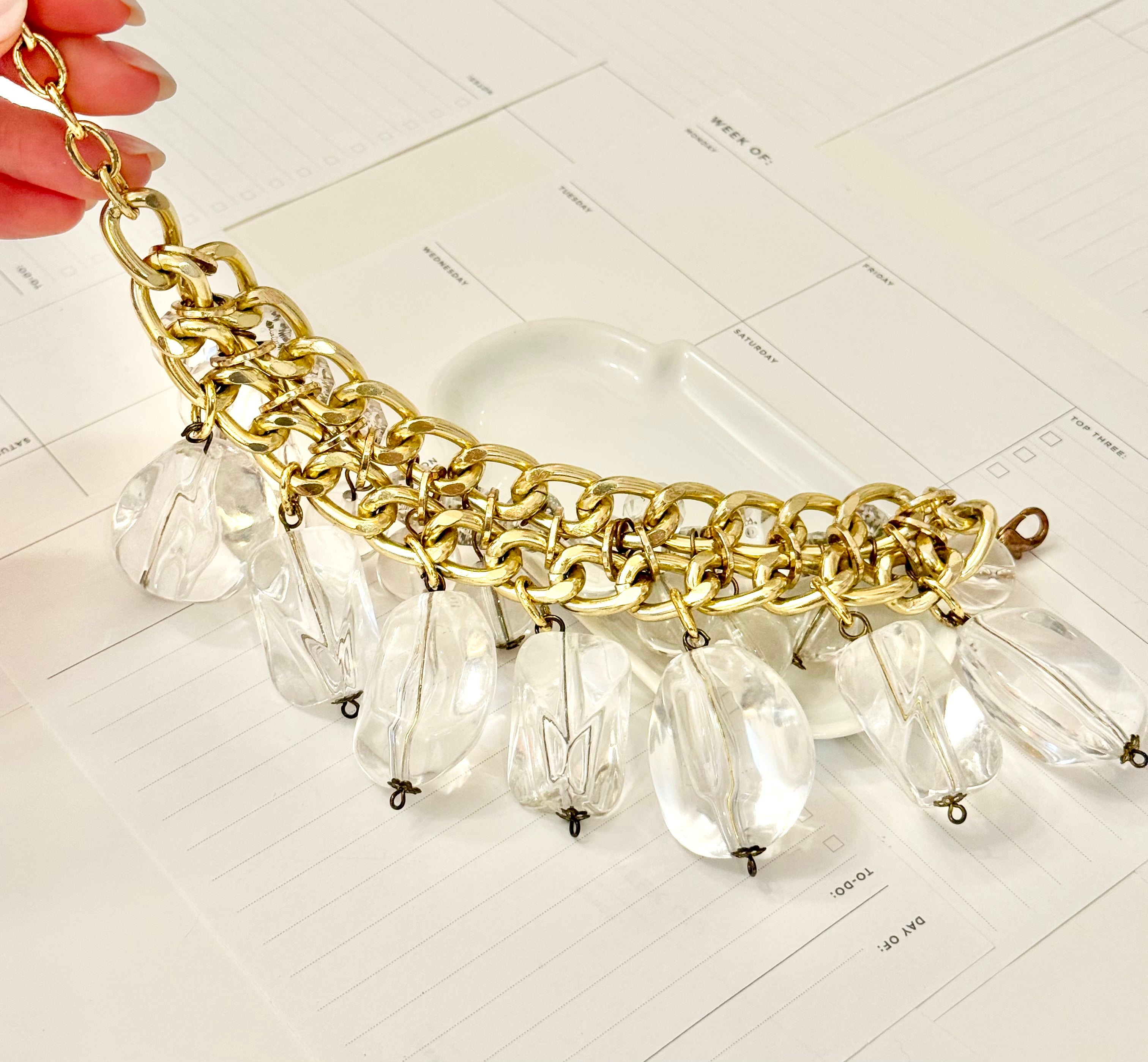 That dramatic lucite charm bracelet....so extraordinary