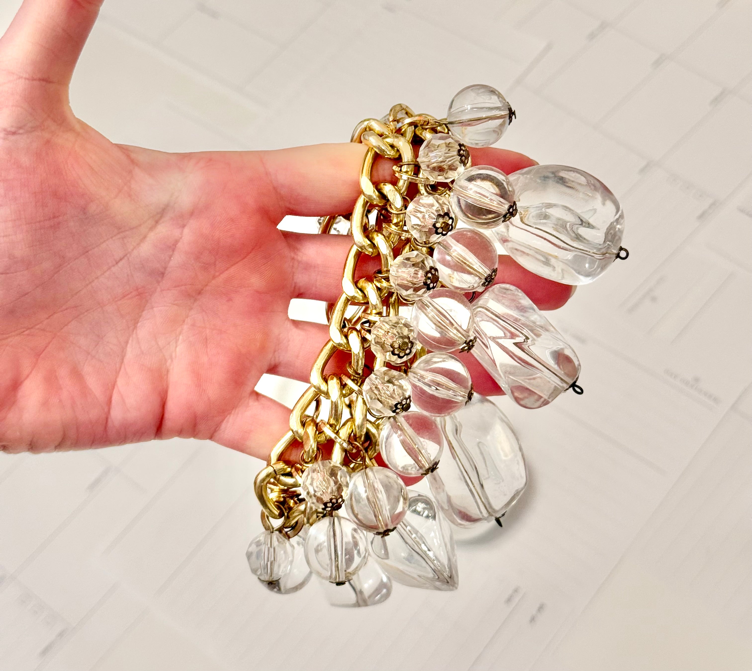 That dramatic lucite charm bracelet....so extraordinary