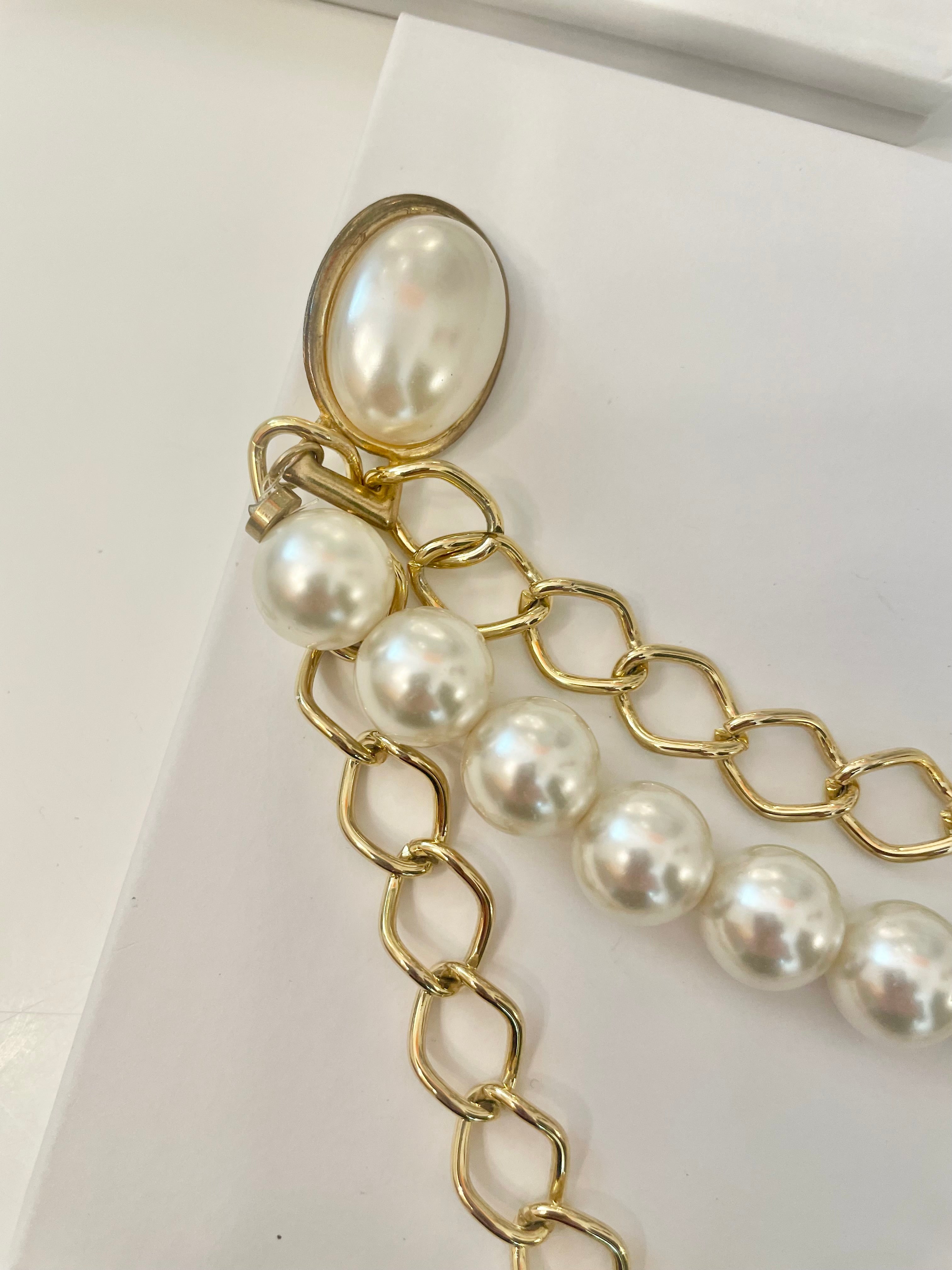Simply divine pearl, and chain sweater connector. So elegant...