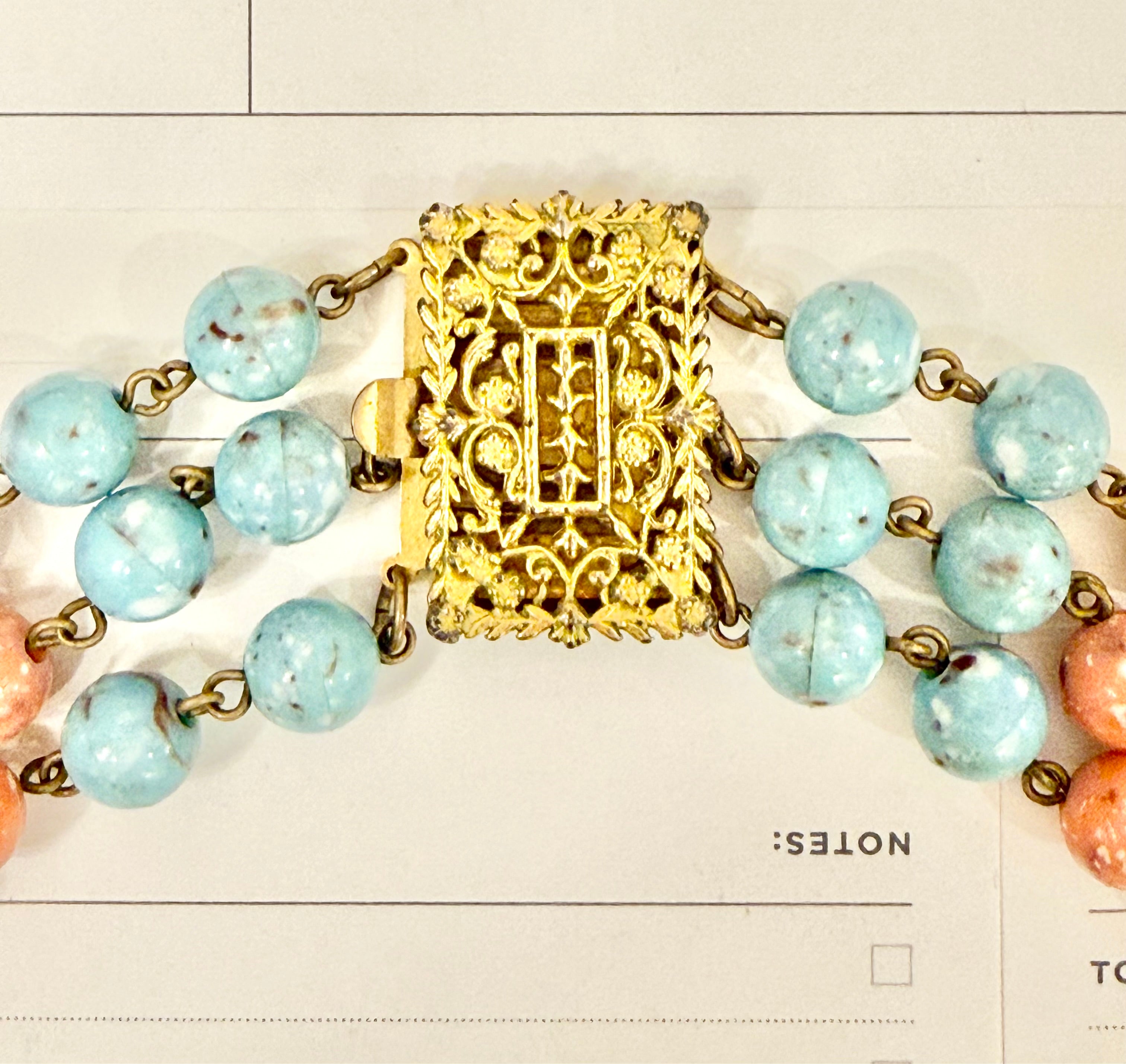 The classy gal and her love of coral, and turquoise!