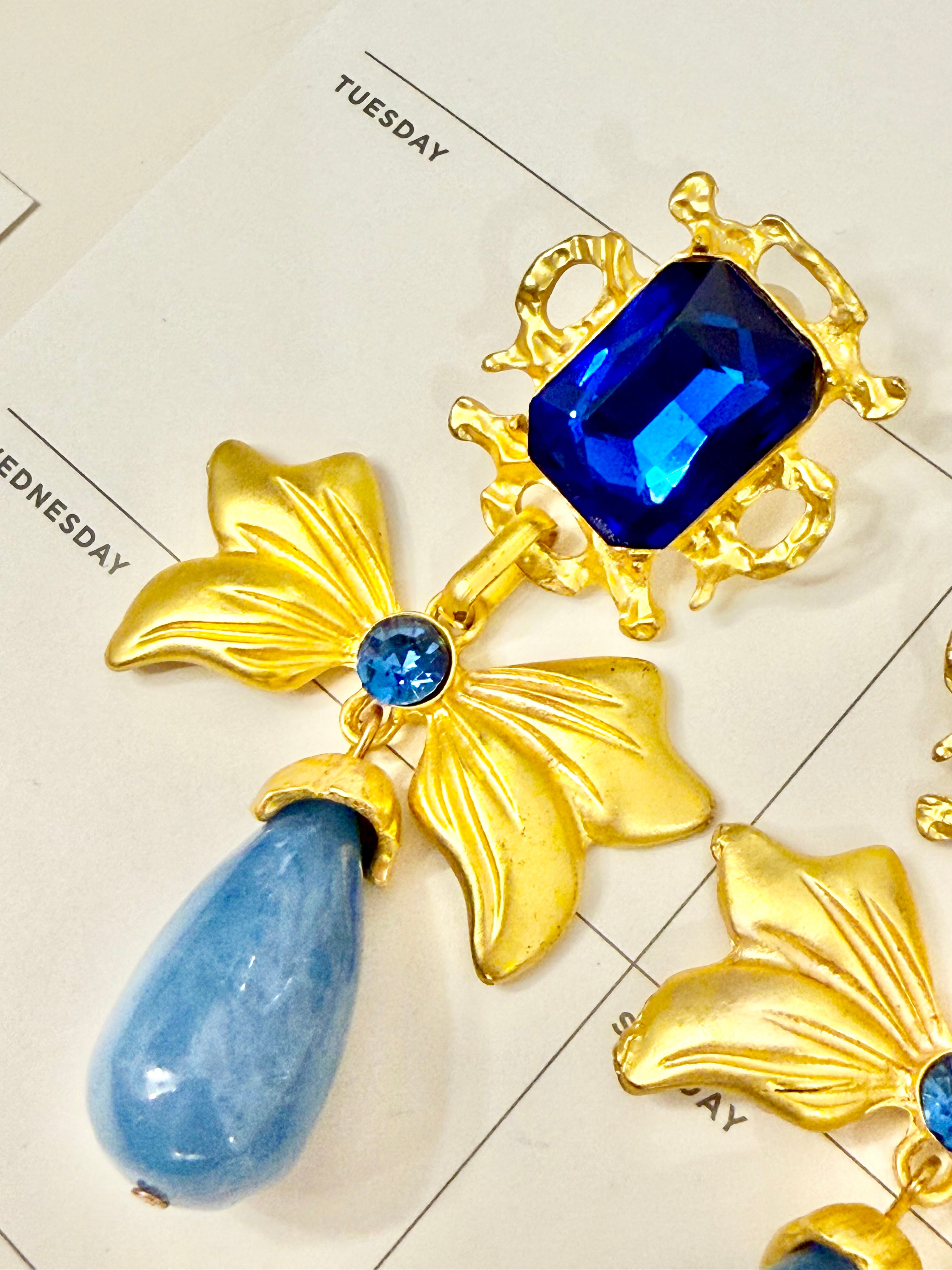 The most preppy sapphire blue bow earrings...