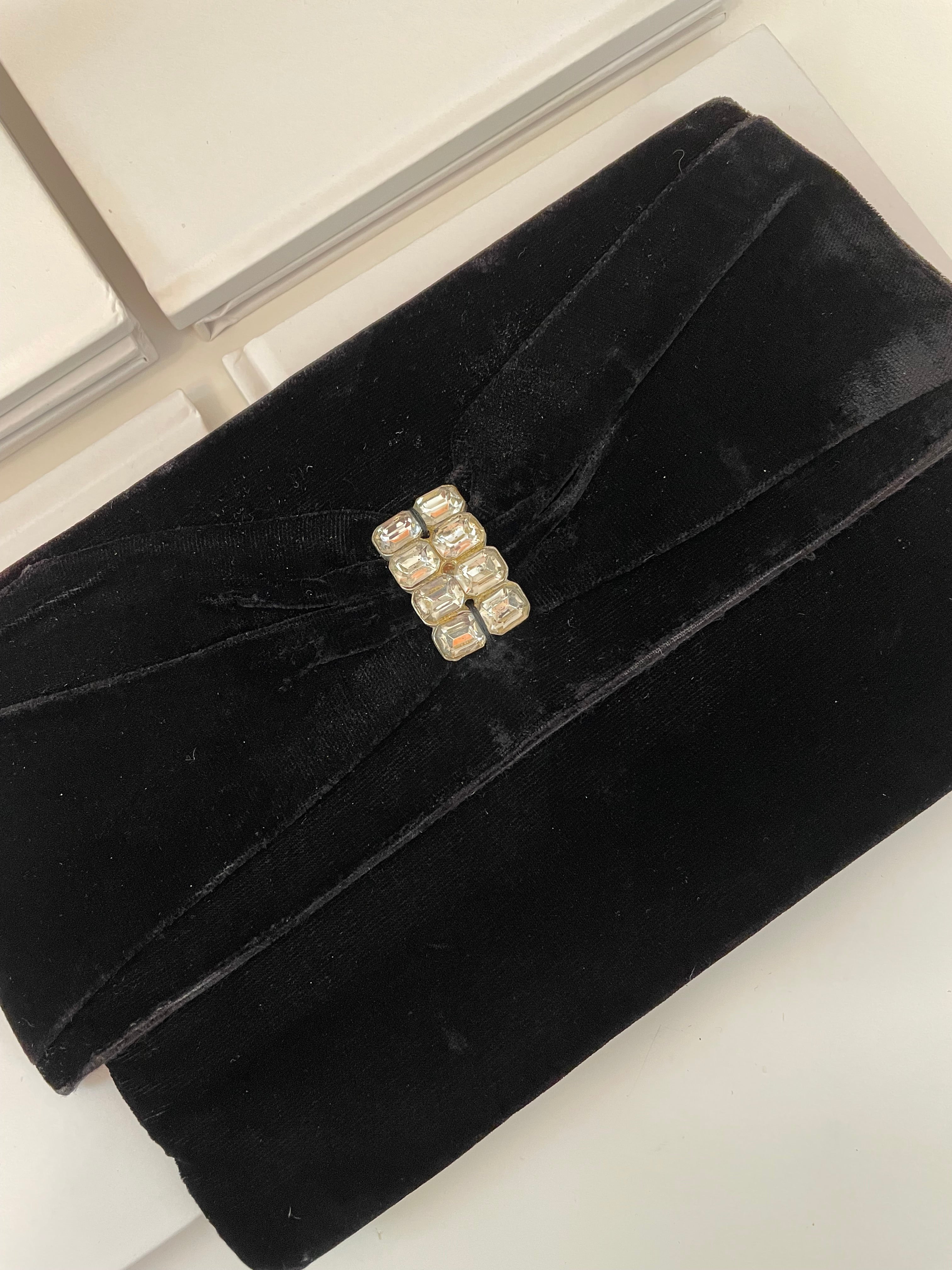 The Socialite and her love of a gem studded velvet clutch bag... 1950's chic