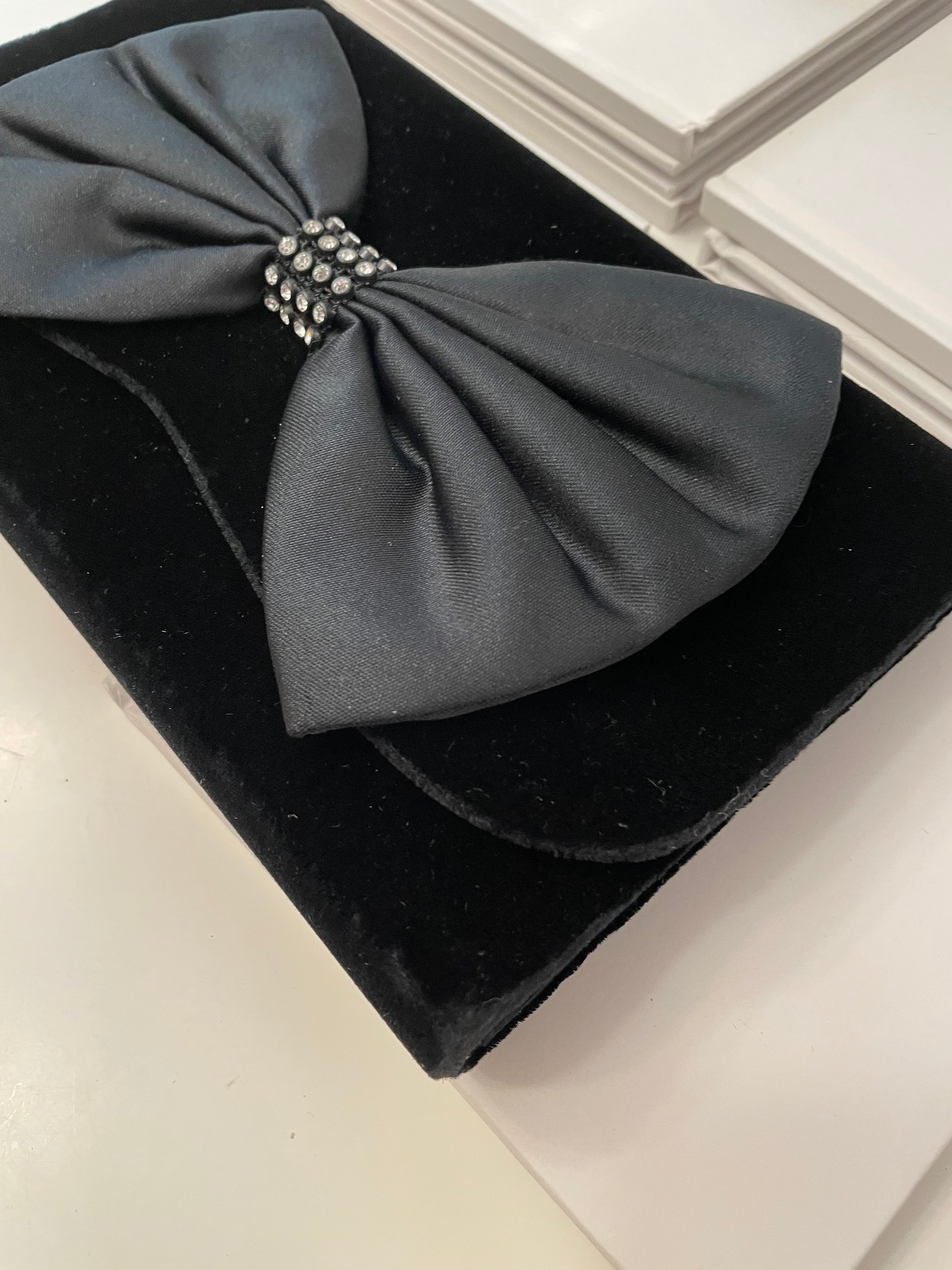 A truly preppy large bow noir velvet evening bag....so classy