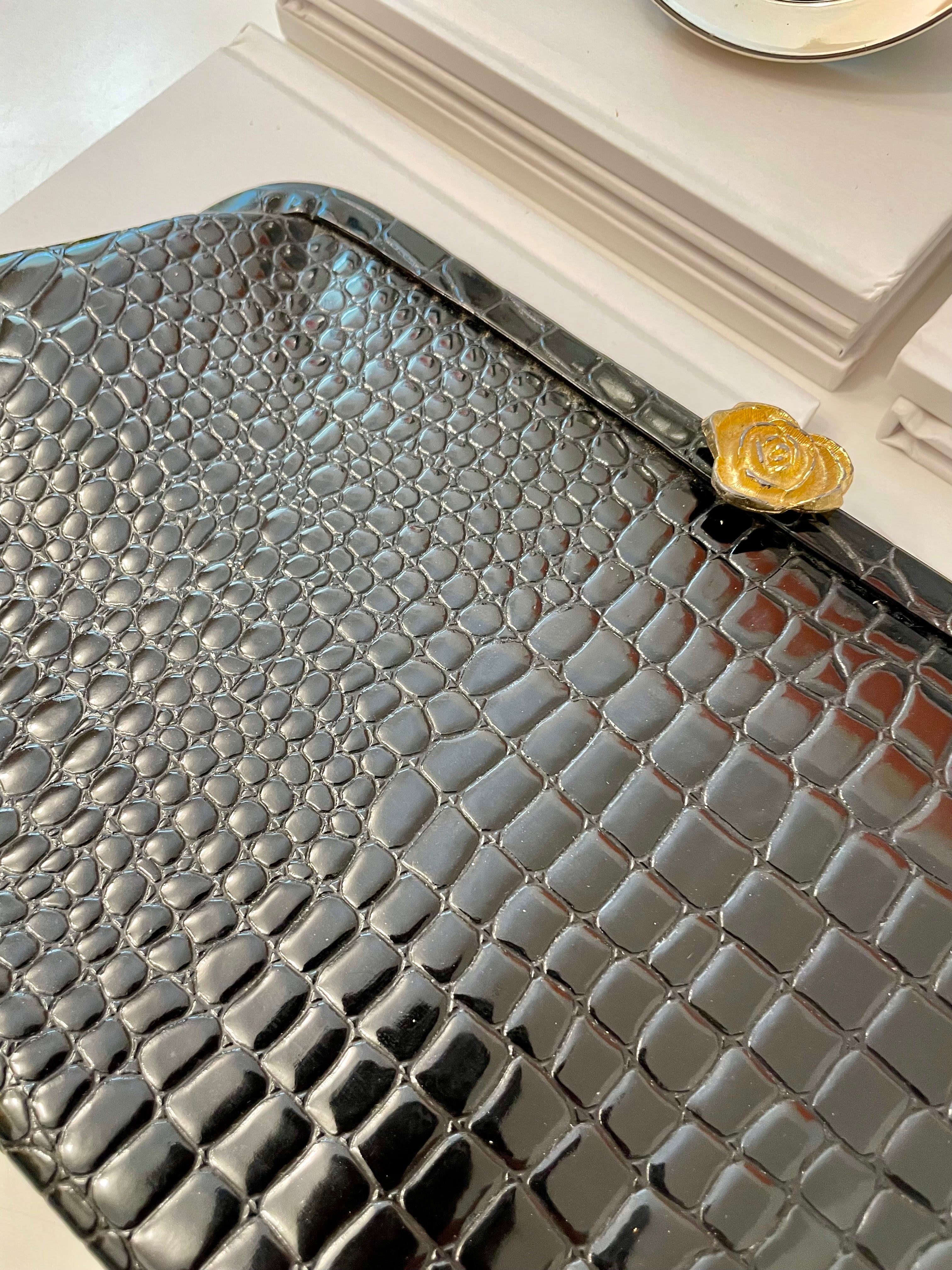 The Socialite and her love of the classy, and the timeless! This faux croco clutch bag is truly divine.