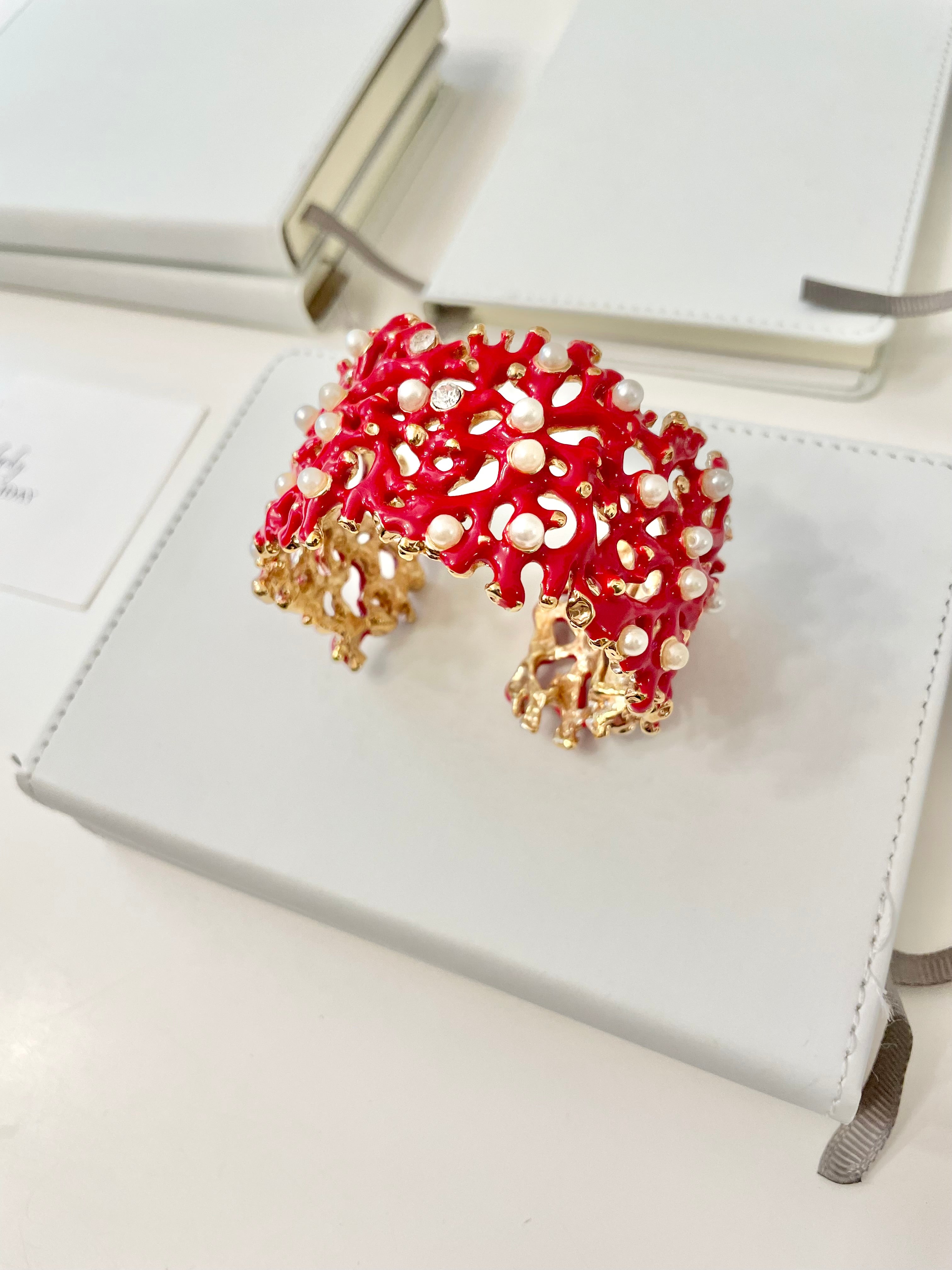 Kenneth Jay Lane, lovely coral cuff bracelet, with a dusting of pearls, and rhinestones! so chic