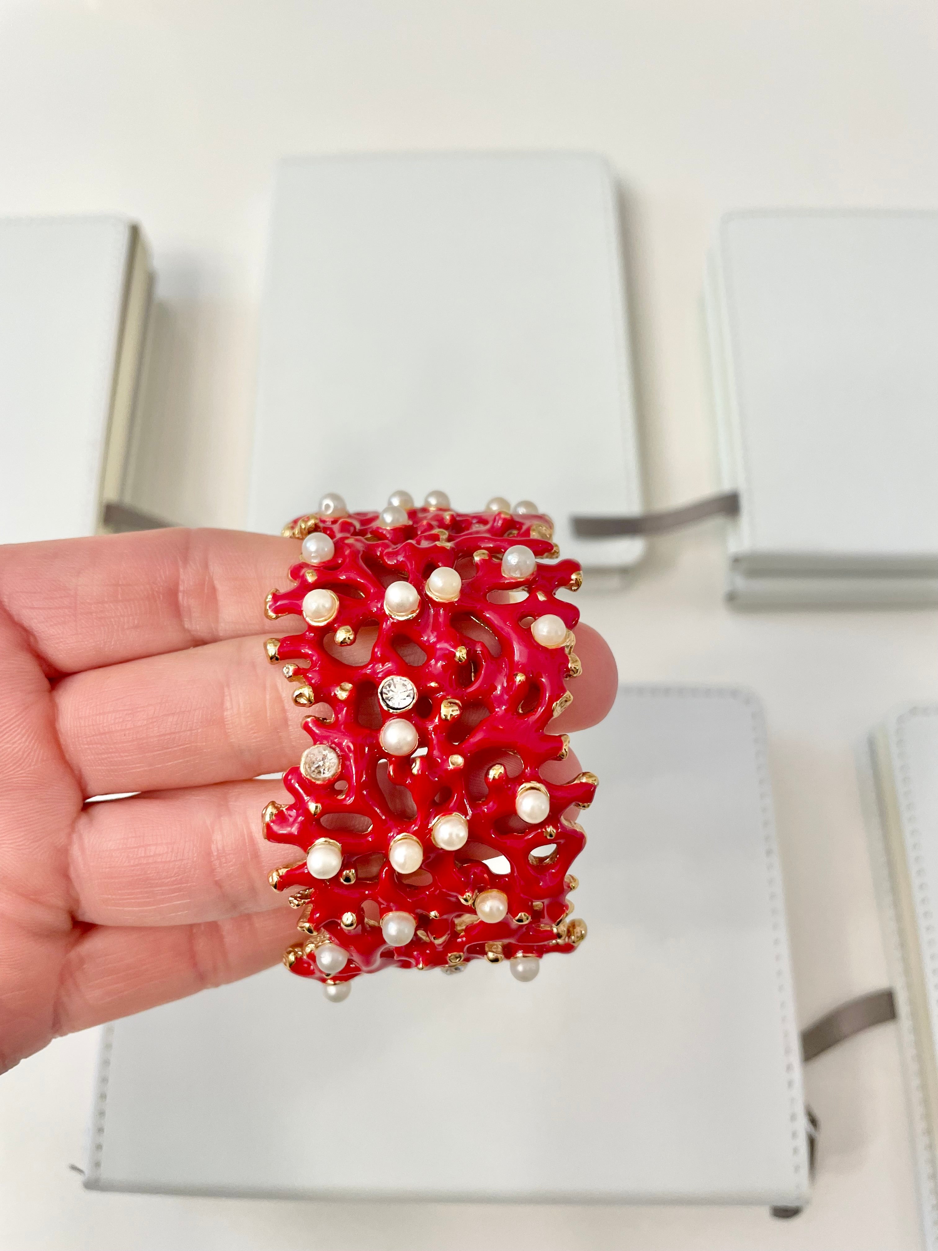 Kenneth Jay Lane, lovely coral cuff bracelet, with a dusting of pearls, and rhinestones! so chic