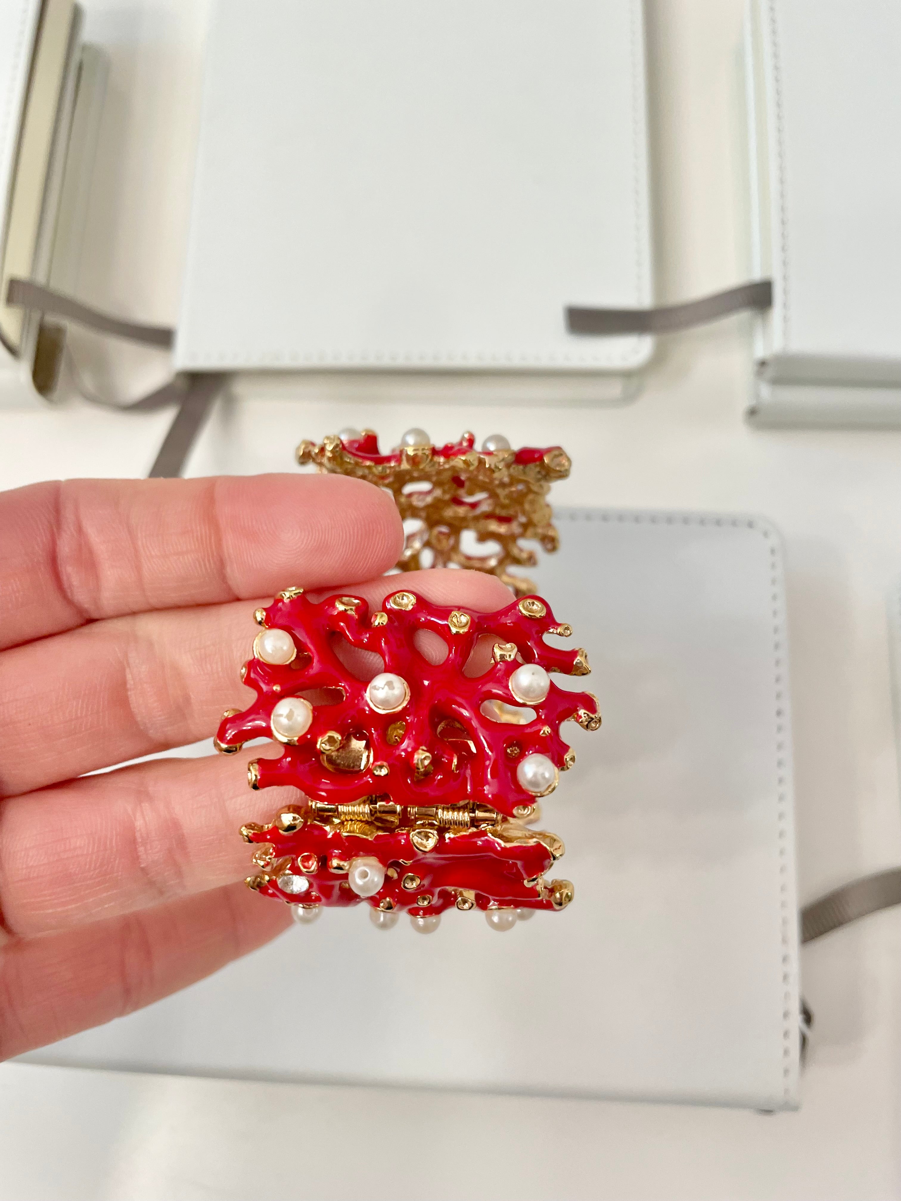 Kenneth Jay Lane, lovely coral cuff bracelet, with a dusting of pearls, and rhinestones! so chic