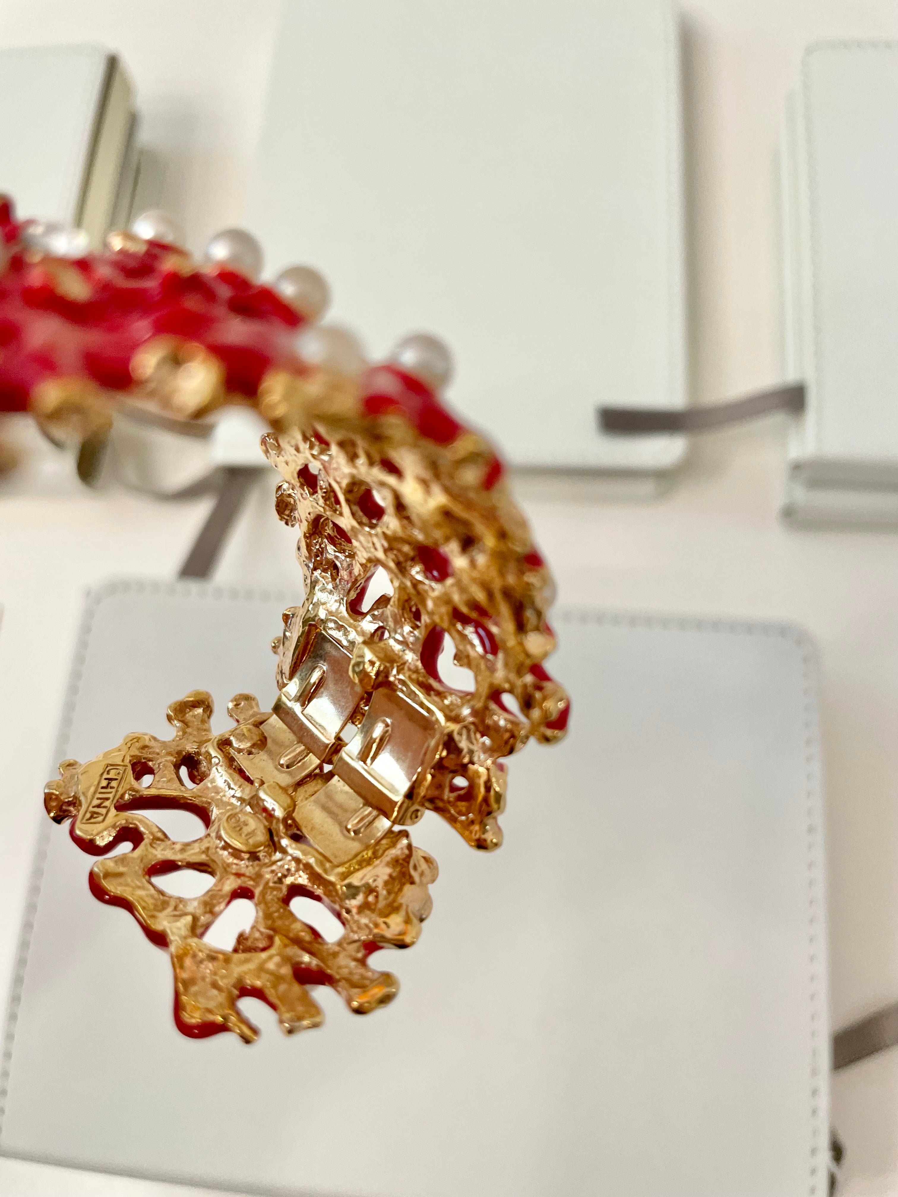 Kenneth Jay Lane, lovely coral cuff bracelet, with a dusting of pearls, and rhinestones! so chic