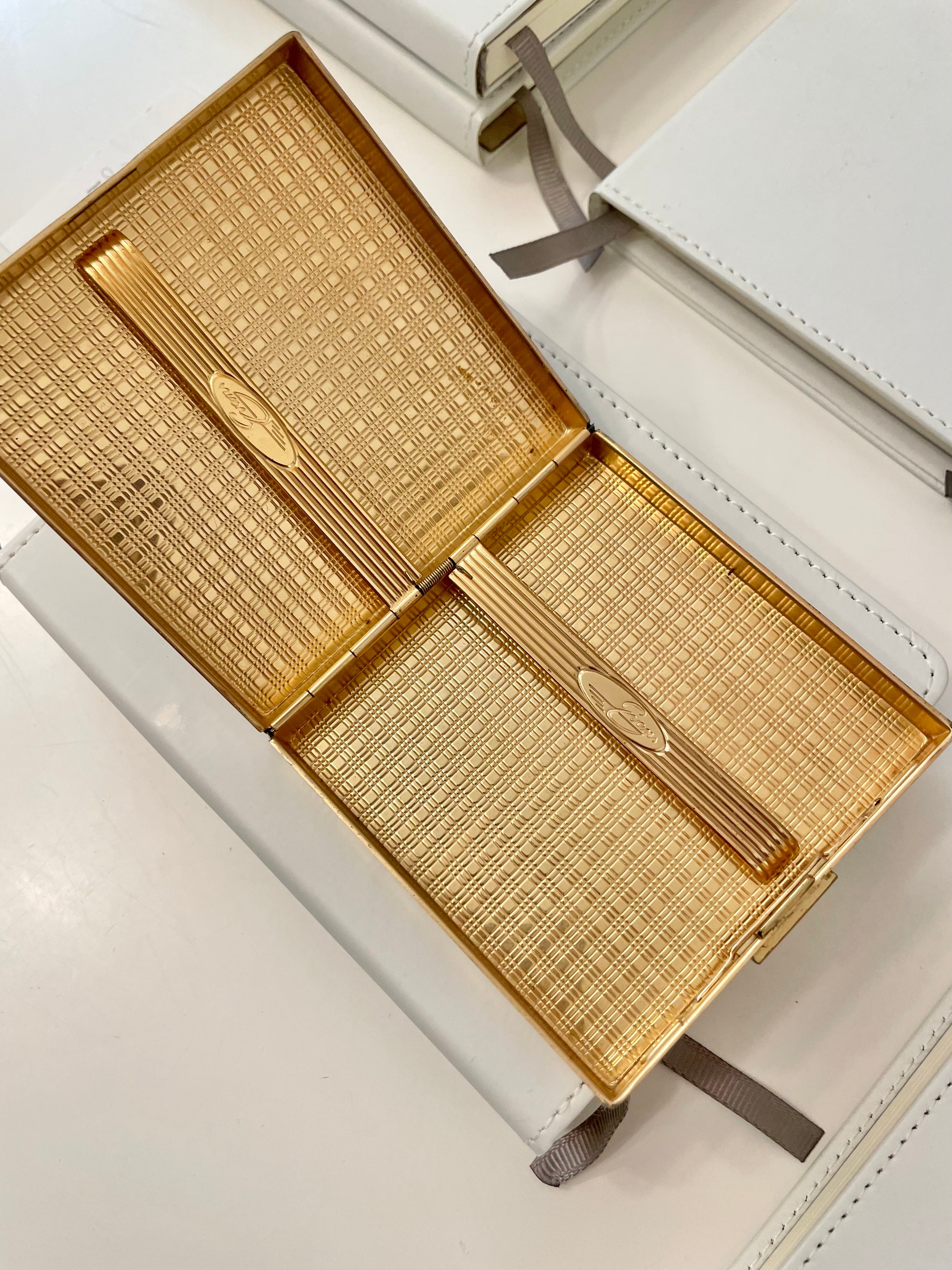 Super chic, gold cigarette case, with a monogram.. oh the stories this lovely piece can tell!