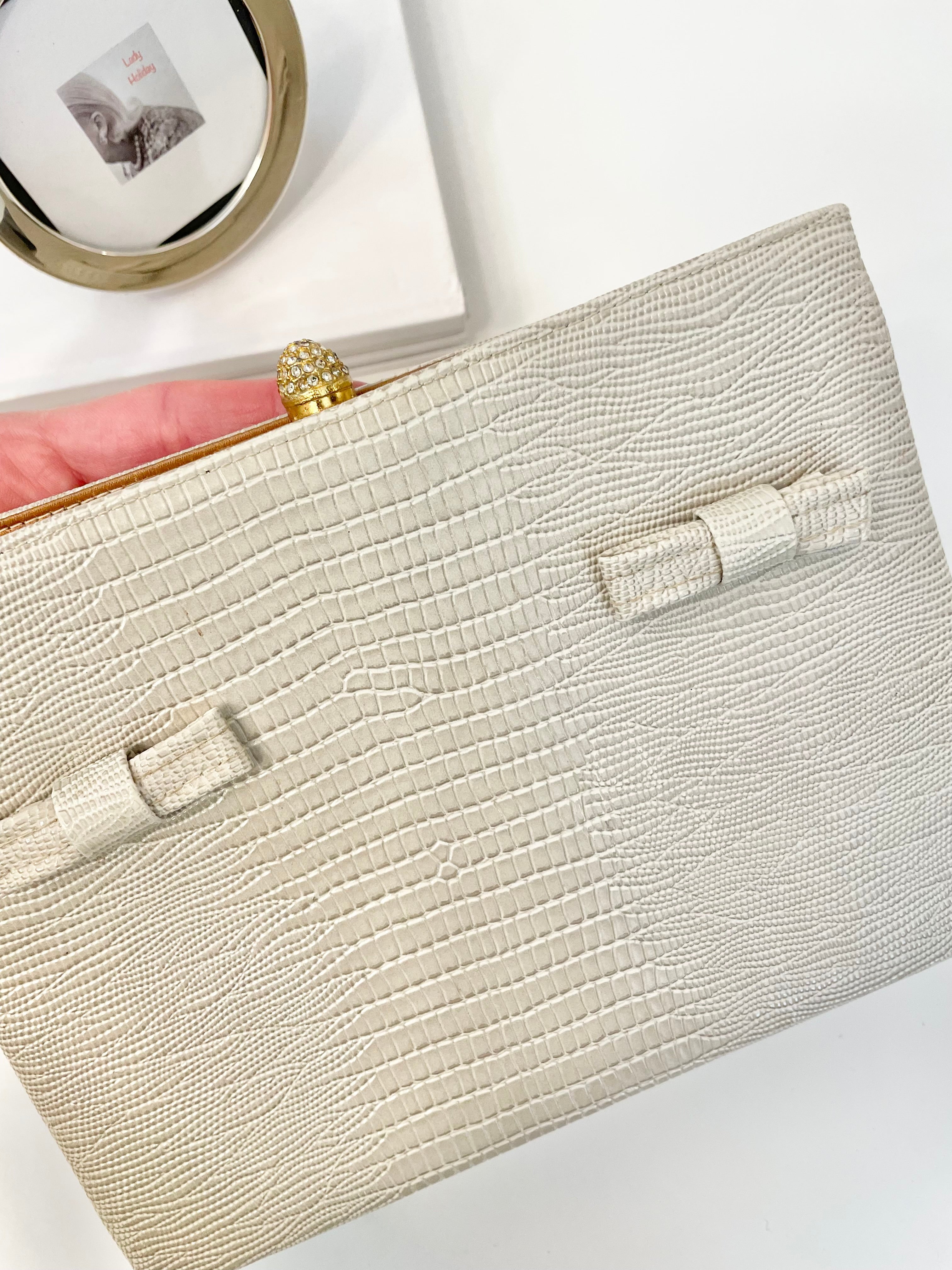 Vintage 1960's classy ivory embossed lizard ladies who lunch bag, with feminine bow details!