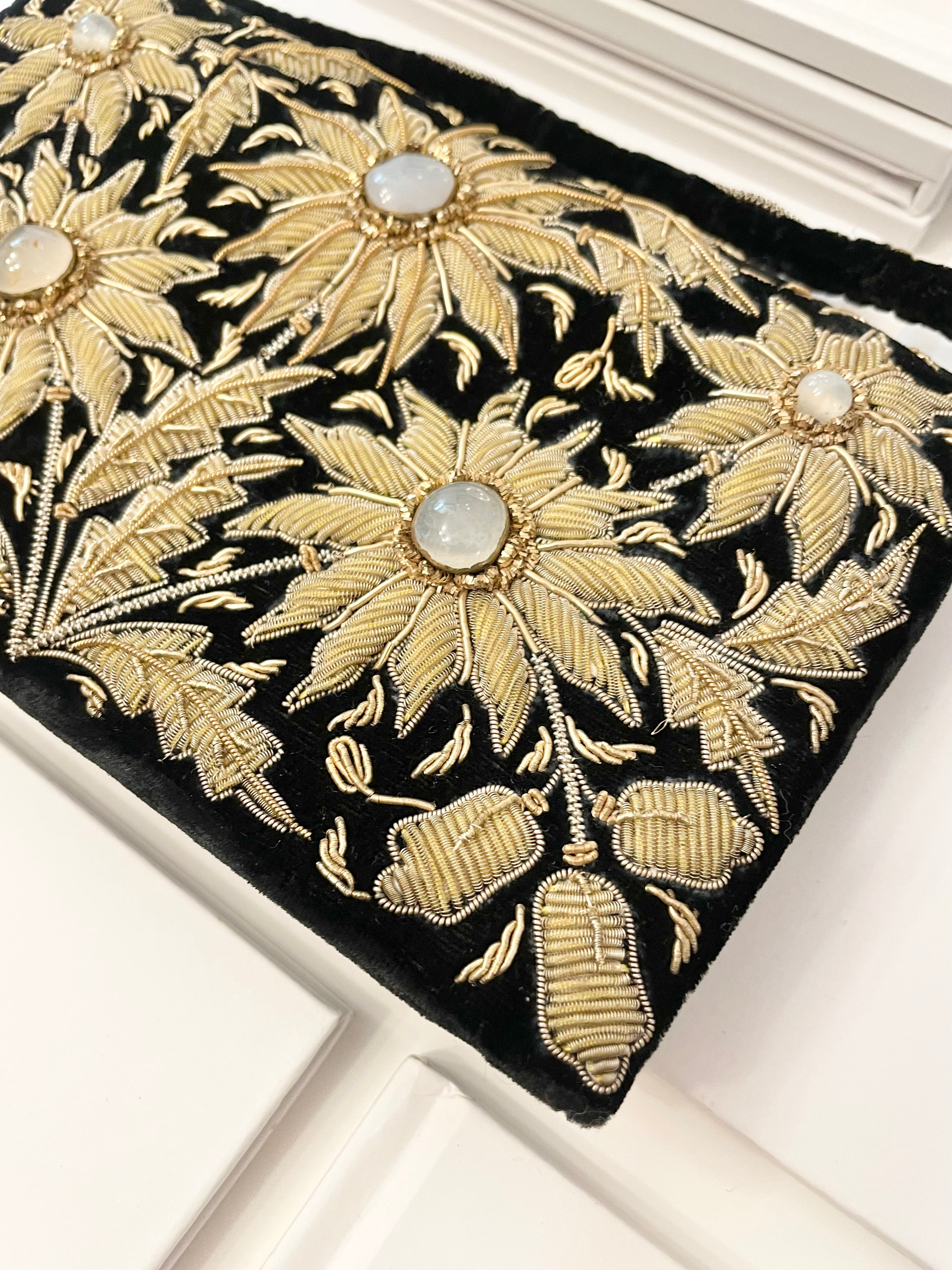Vintage stunning, and elegant faux moonstone noir velvet handbag.... so divine.