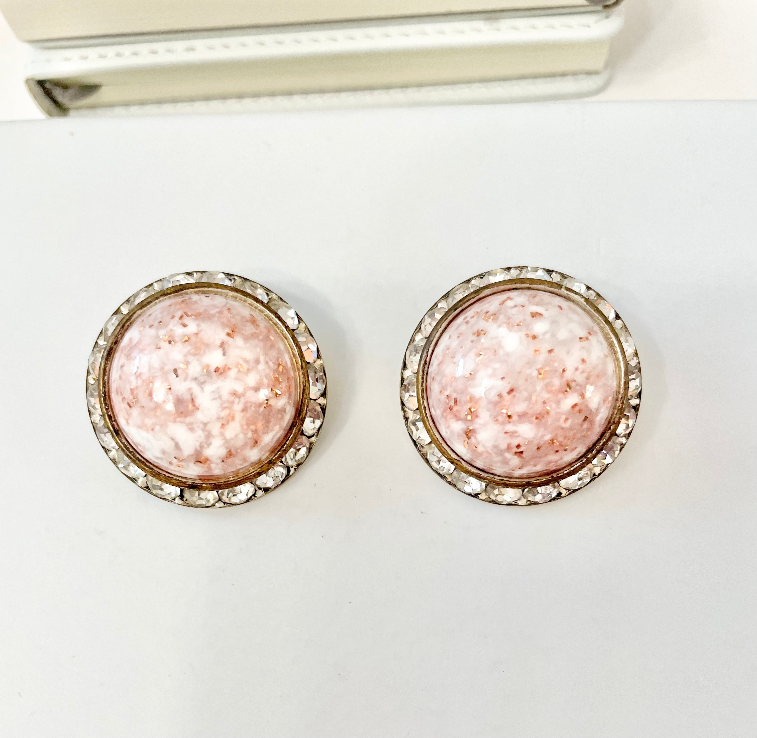 1960's soft pink button earrings, framed with clear glass stones, so delightful!