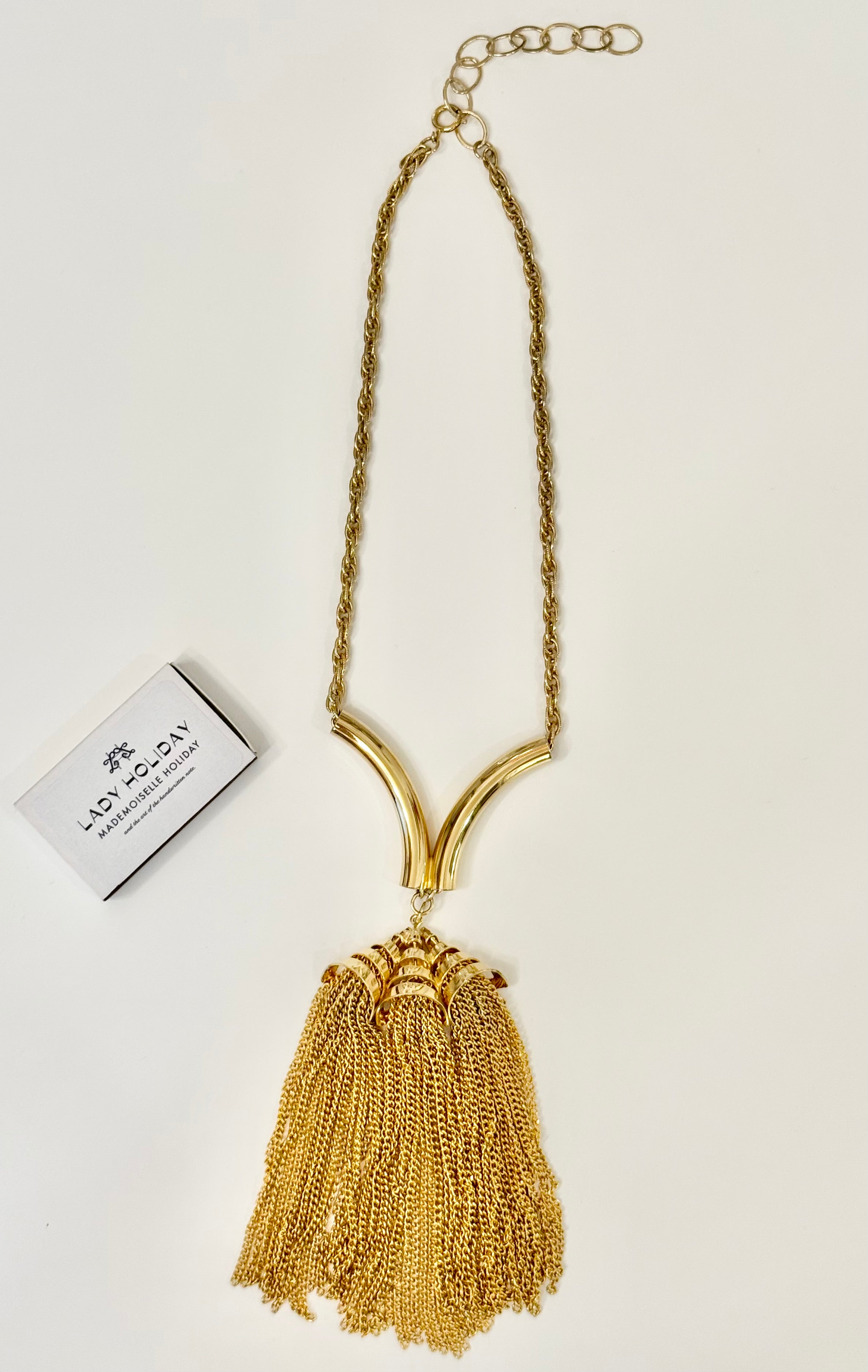 That charming gal and her gold tassels....