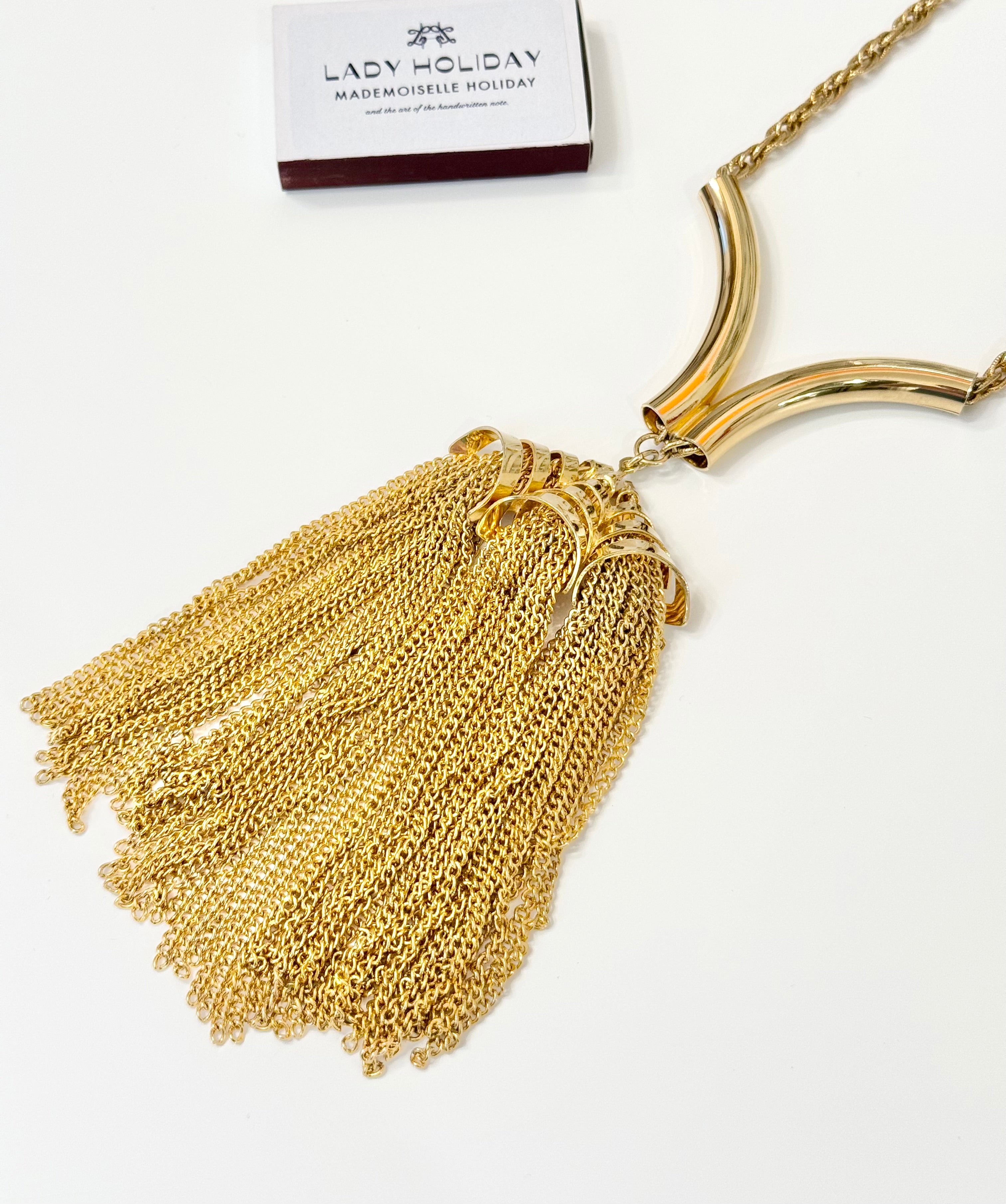 That charming gal and her gold tassels....