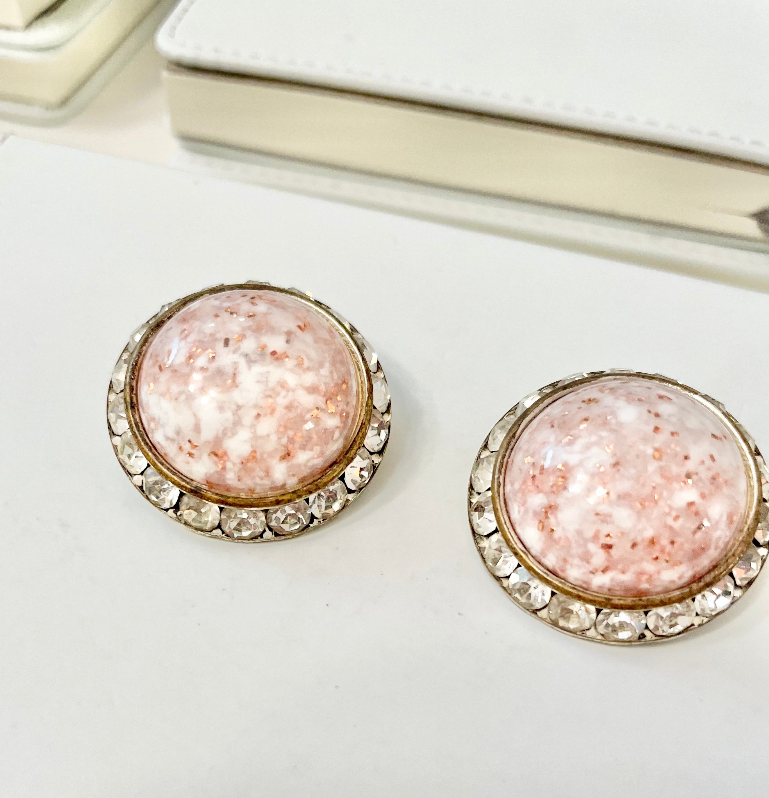 1960's soft pink button earrings, framed with clear glass stones, so delightful!