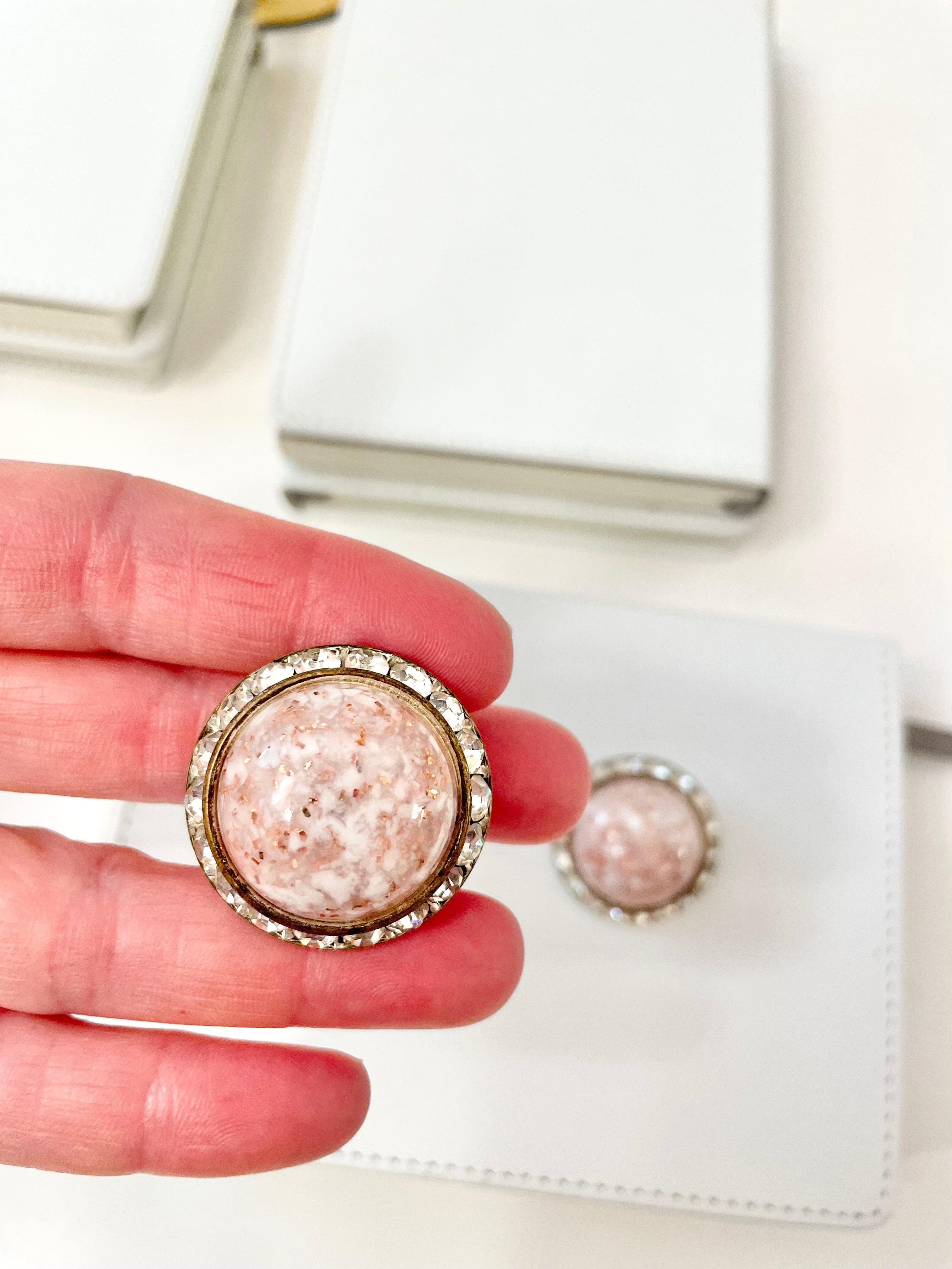 1960's soft pink button earrings, framed with clear glass stones, so delightful!