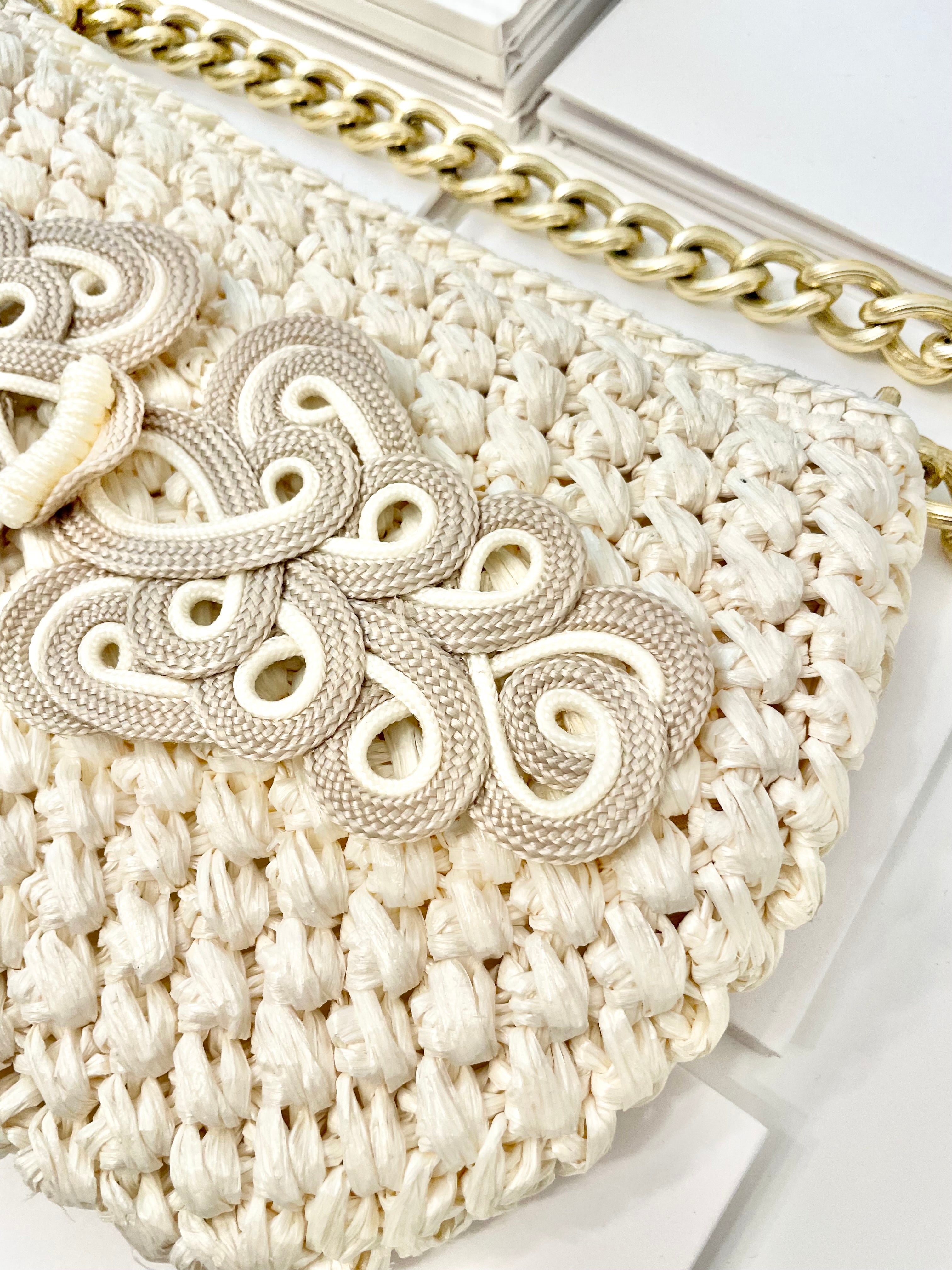 Vintage super sassy 1960's ivory straw bag with a classy gold chain... so elegant.