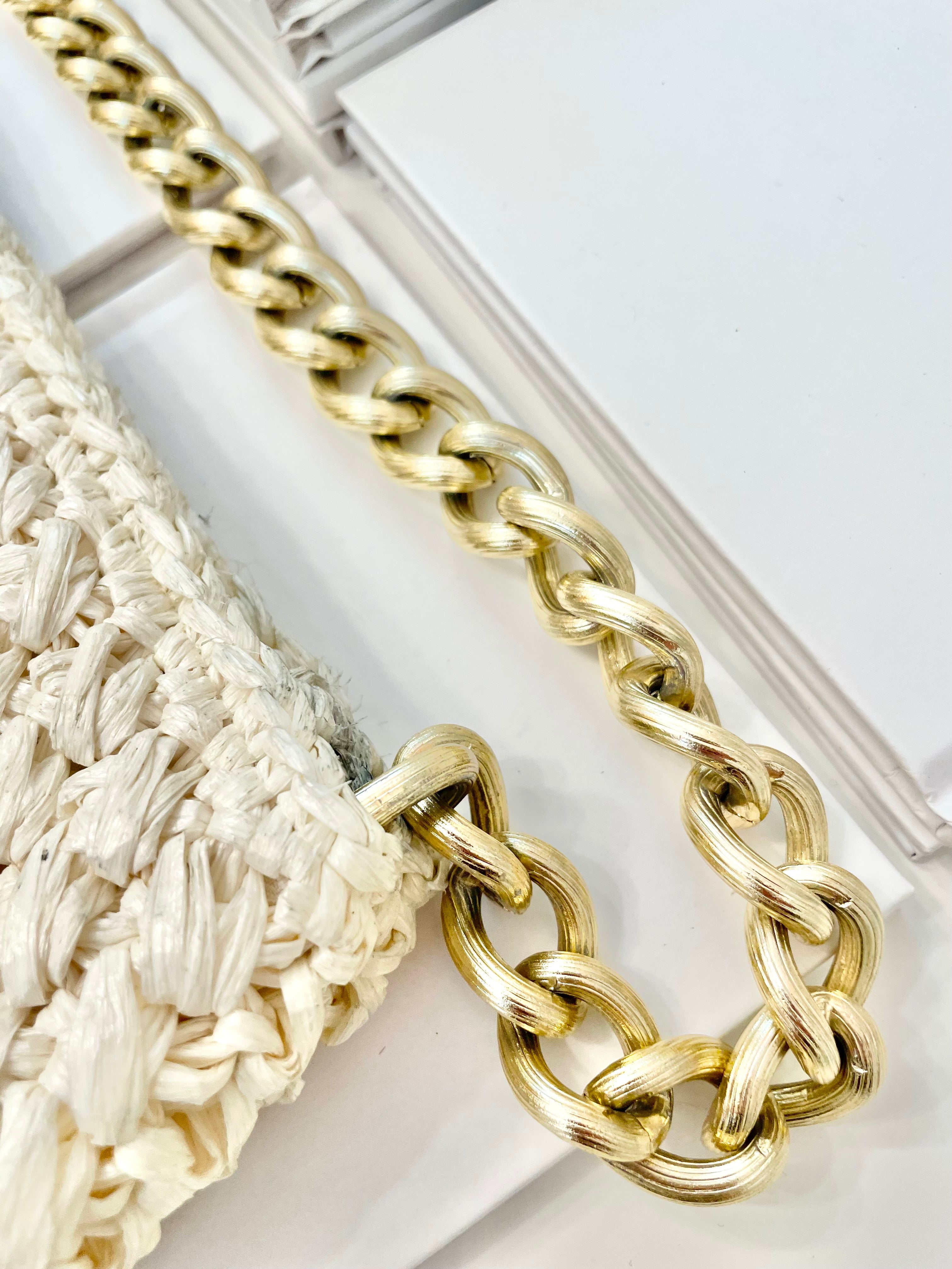 Vintage super sassy 1960's ivory straw bag with a classy gold chain... so elegant.