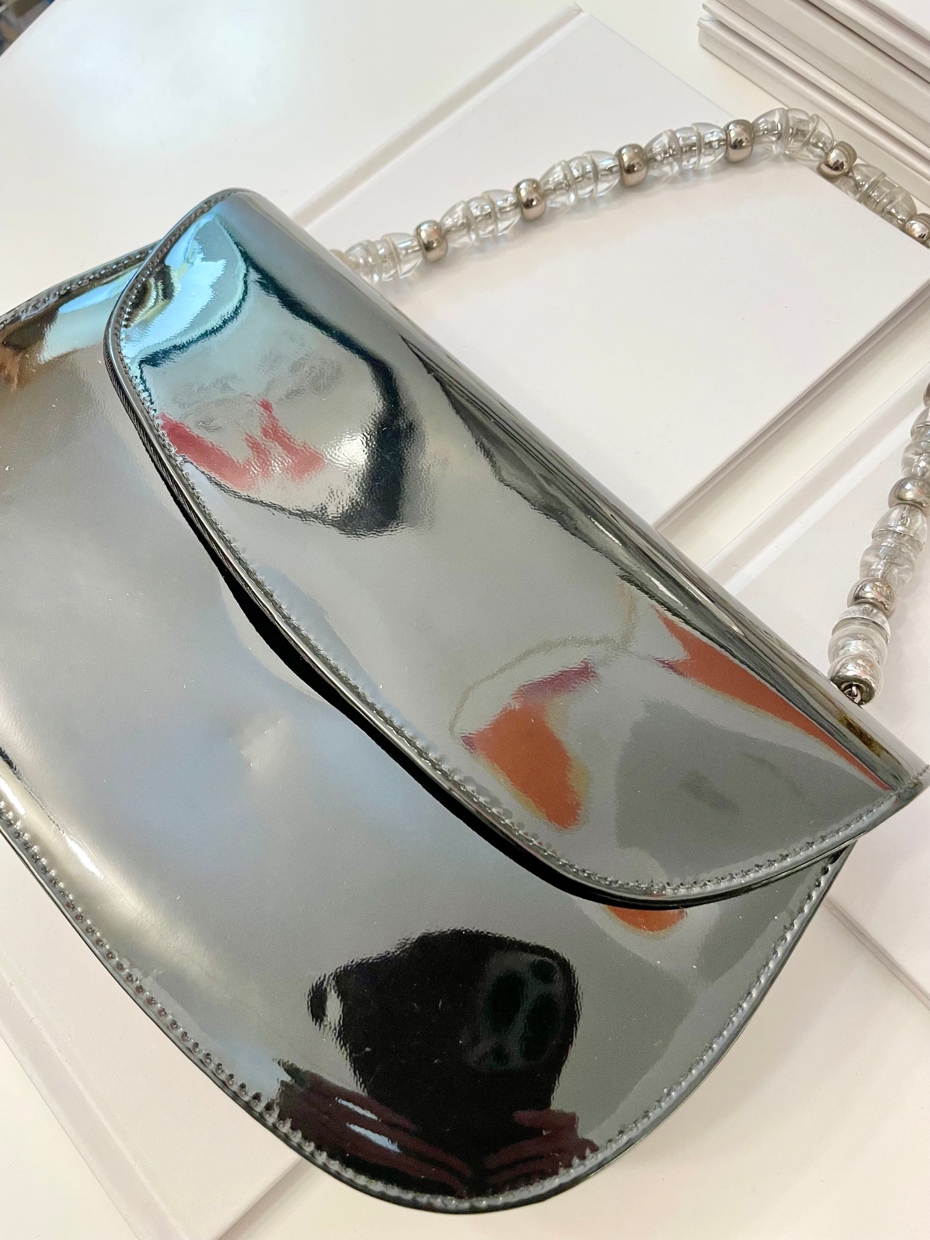 Truly classic faux patent leather, and lucite handle ladies purse... so classy!