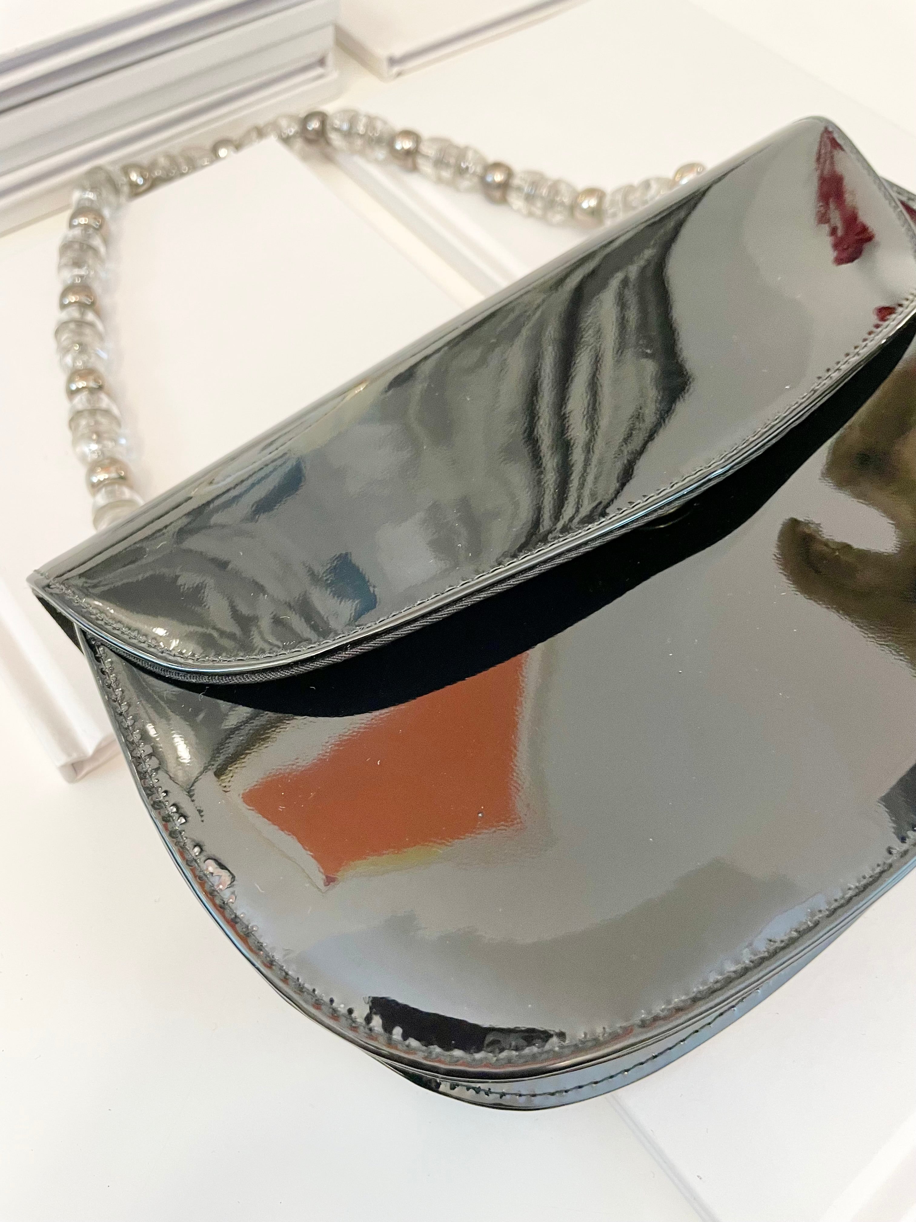 Truly classic faux patent leather, and lucite handle ladies purse... so classy!