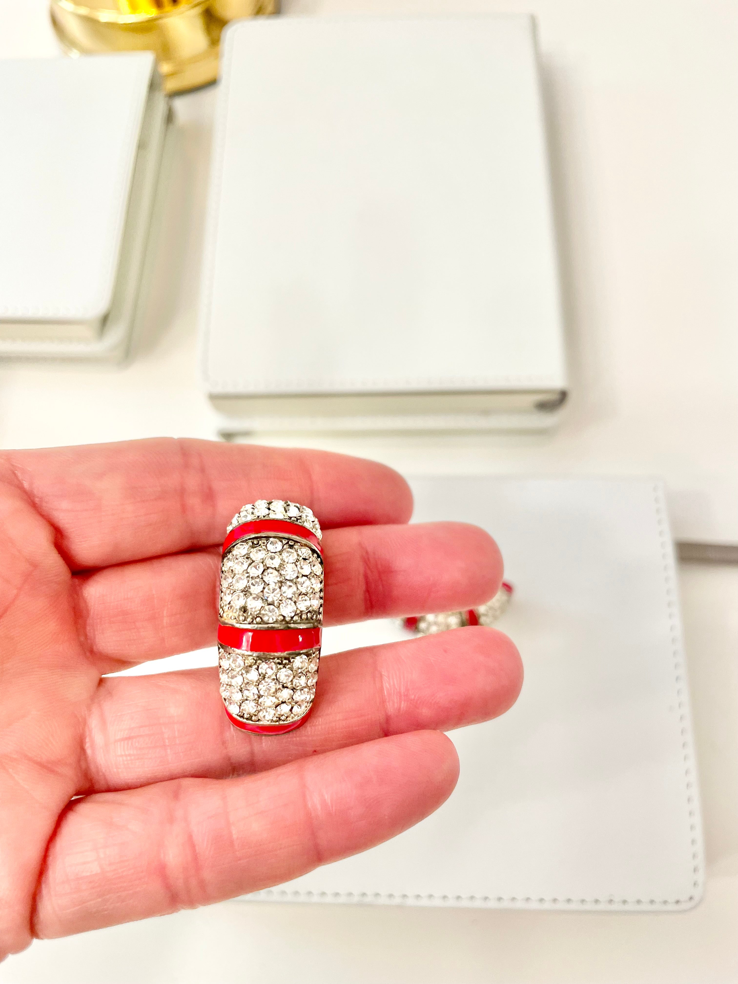 Vintage 1970's pave set stone hoop style clip on earrings, with red enamel details... so classy