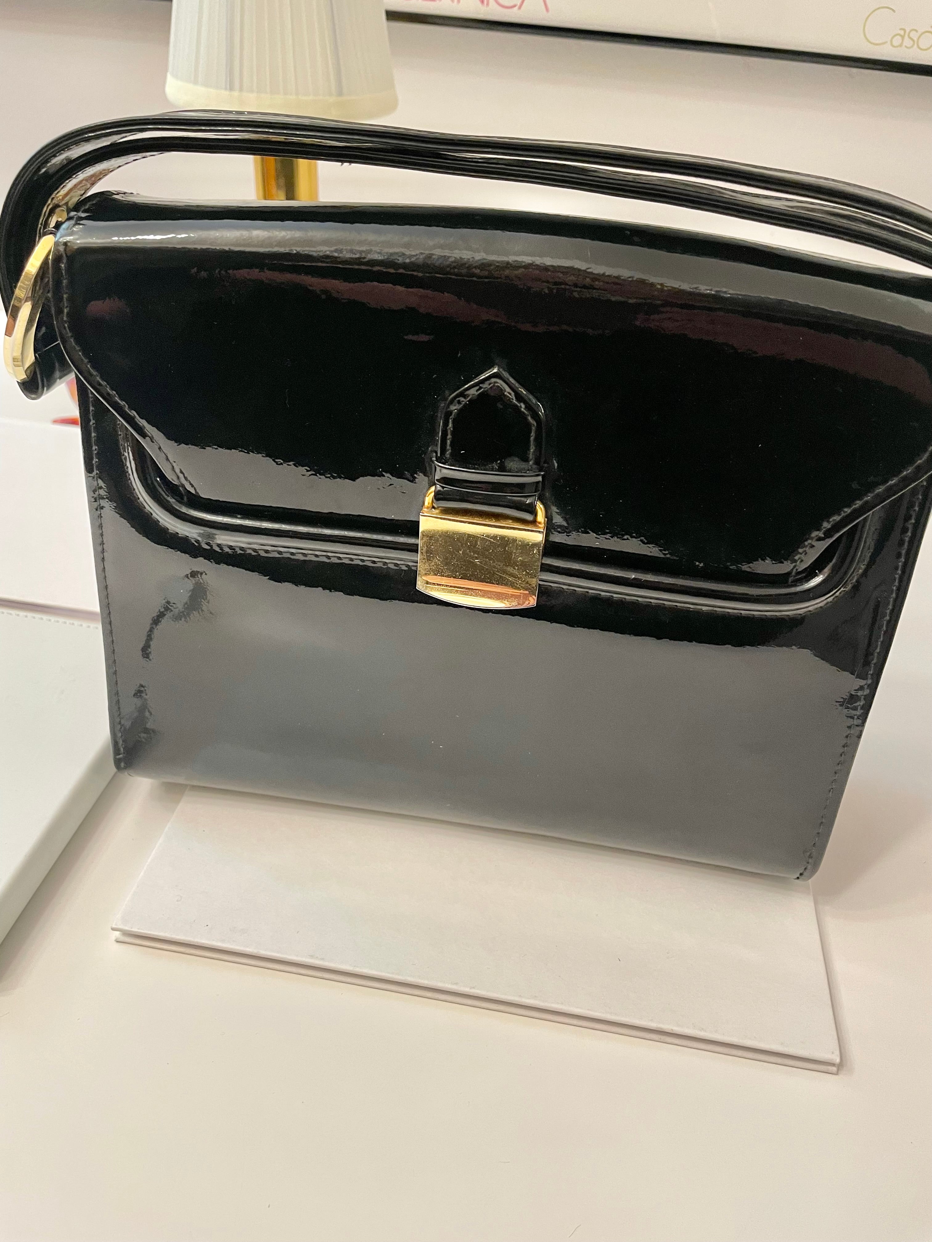 Vintage classy Saks Fifth Ave, black patent leather Kelly style bag... so classic!