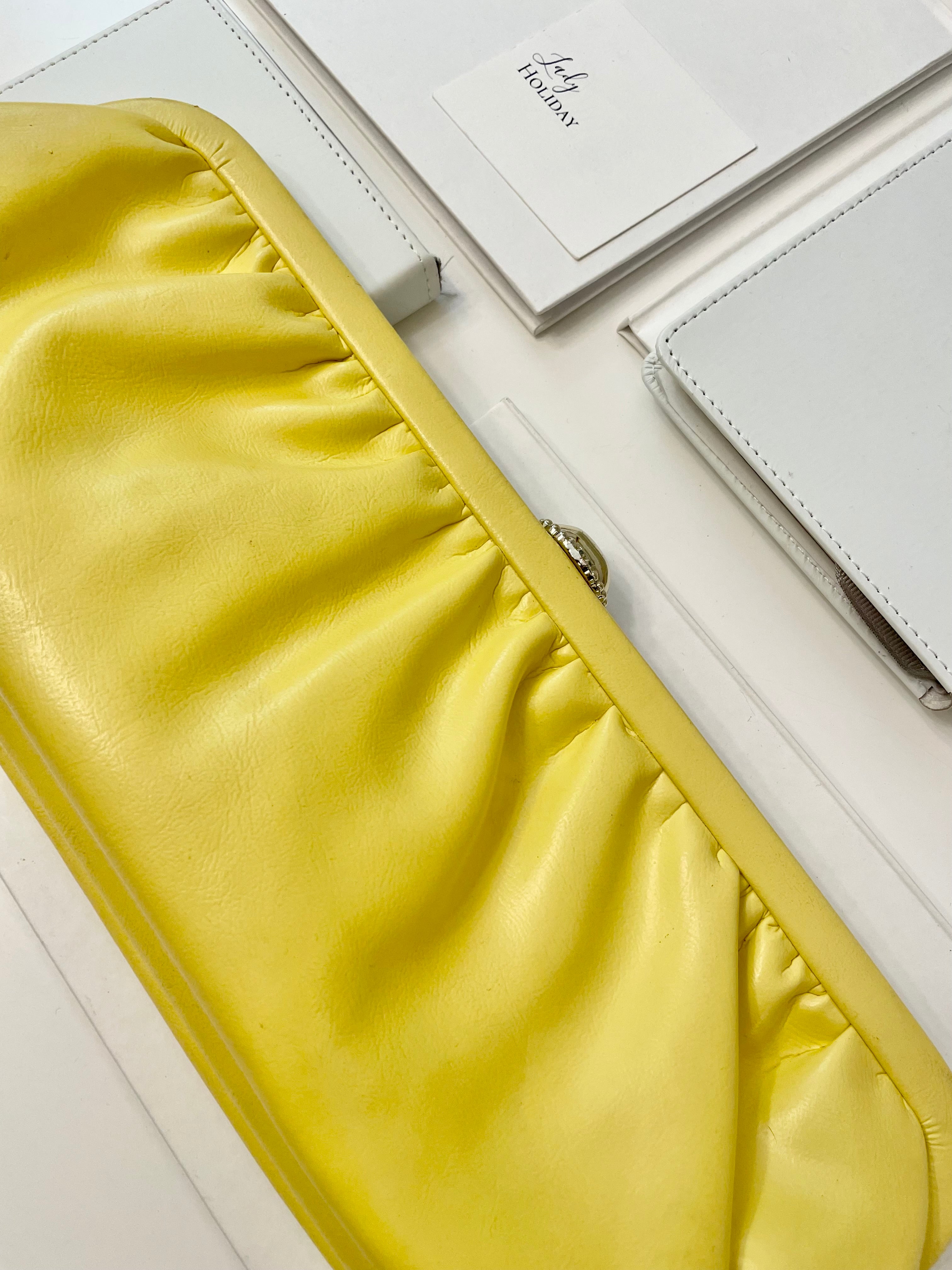 The Cocktail hour bag... so chic. This 1960's bright yellow long clutch bag, is exactly the perfect bag for ladies night with the gals!