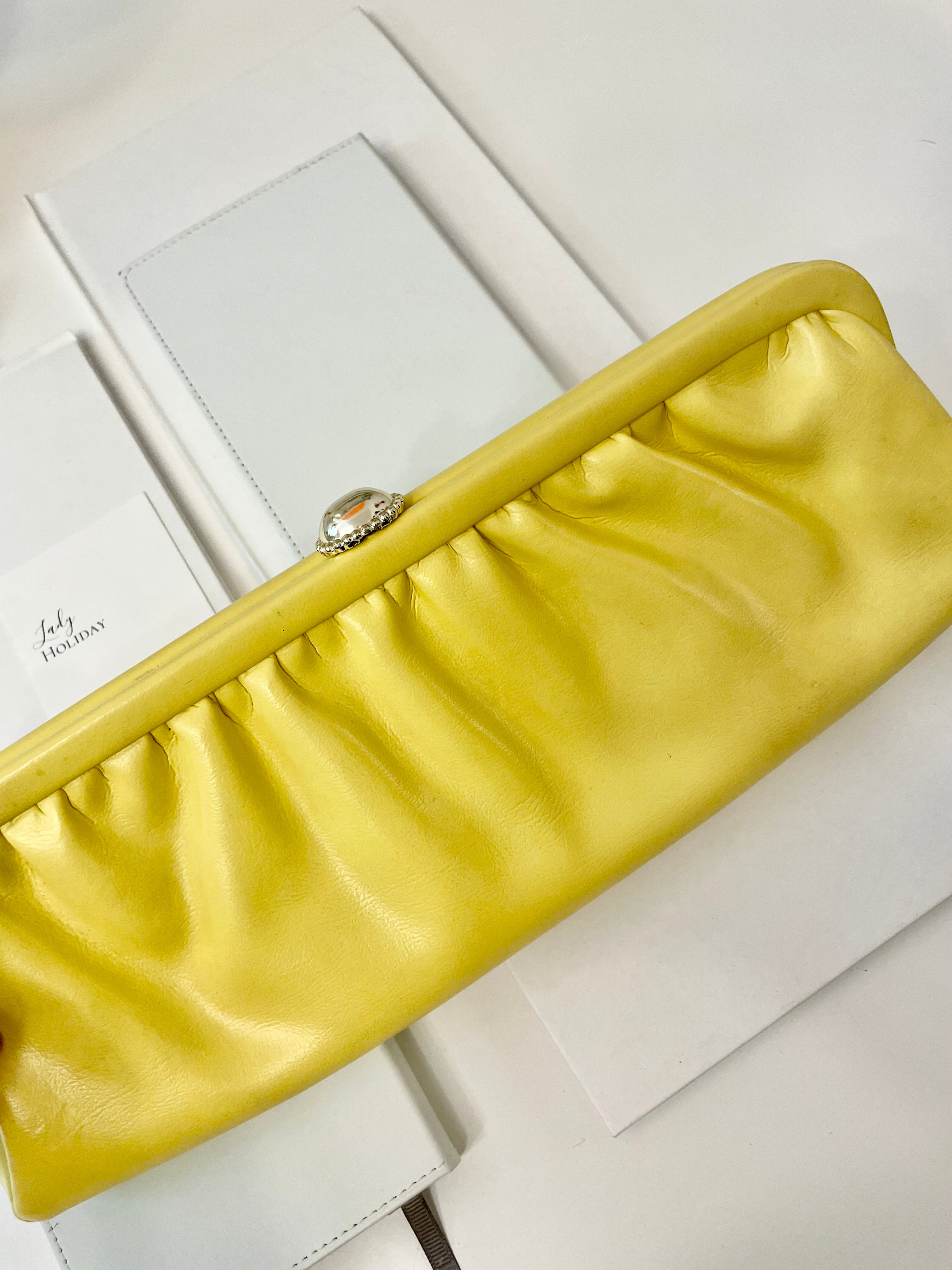 The Cocktail hour bag... so chic. This 1960's bright yellow long clutch bag, is exactly the perfect bag for ladies night with the gals!