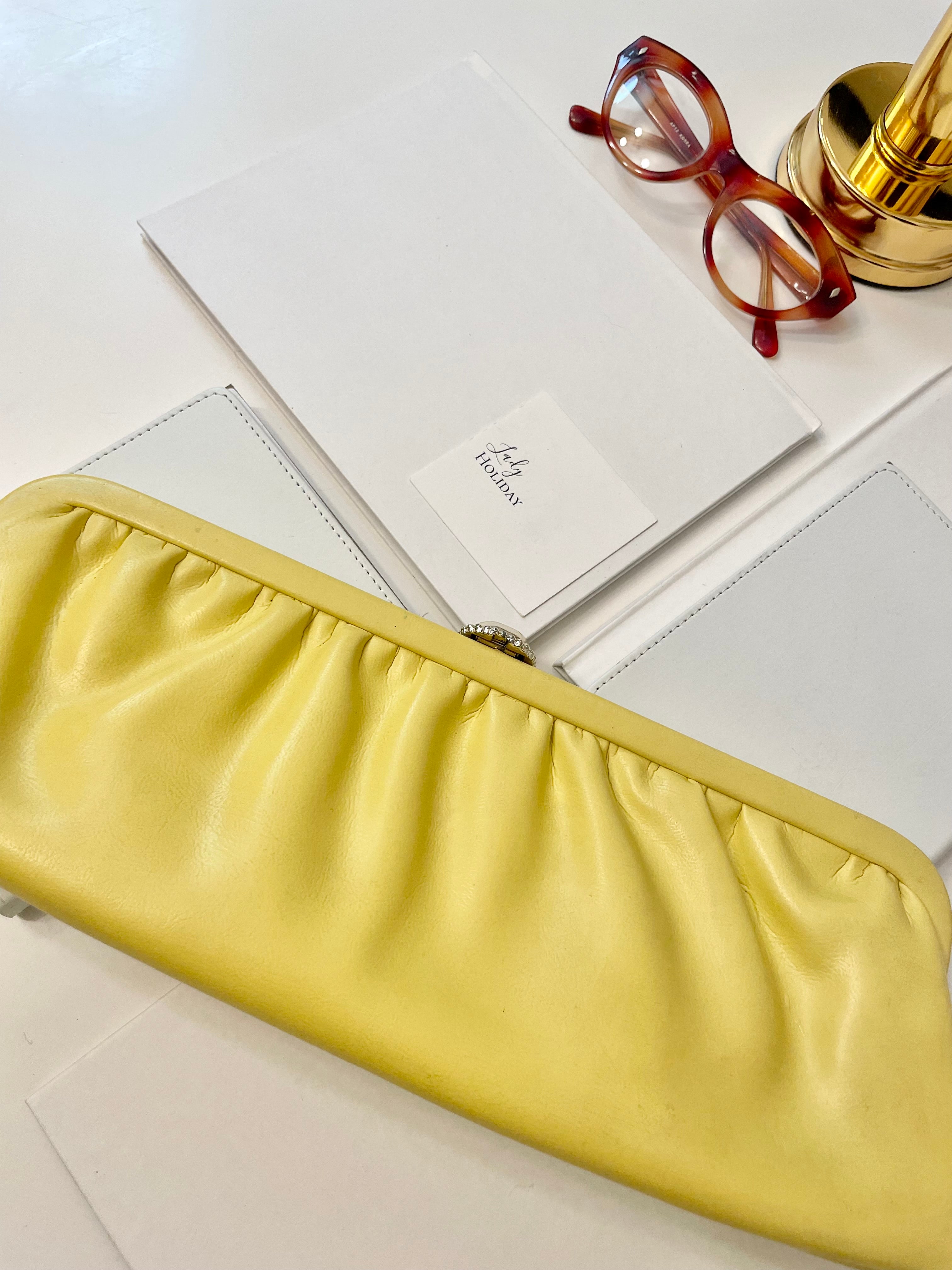 The Cocktail hour bag... so chic. This 1960's bright yellow long clutch bag, is exactly the perfect bag for ladies night with the gals!